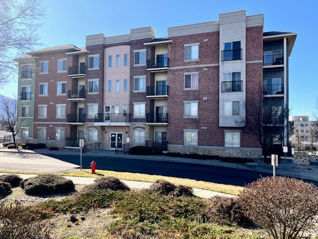 Back on Market! Just finished new paint, carpet, LVP Flooring, ready to move in! Great price on this 3rd floor, 2 bed 2 bath condo, private balcony with amazing views of the mountains and city. Stainless appliances, washer and dryer included! Secure building with underground parking, code to elevator and main entrance. Conveniently located within walking distance to shopping, movies, and more. Easy access to I-15, downtown and ski resorts. Enjoy amenities including pool, picnic, exercise room, clubhouse. Pets ok upon approval. Buyer and agent to verify all information.assigned parking stall #15  Square footage figures are provided as a courtesy estimate only and were obtained from_County Records  Buyer is advised to obtain an independent measurement.