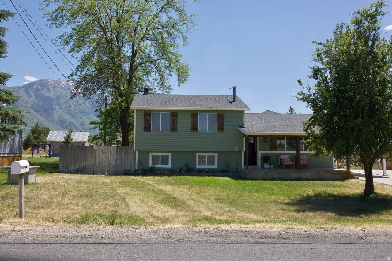 Welcome to your own slice of country paradise in Spanish Fork! Situated on a full acre of usable horse property, this beautifully remodeled home offers the perfect blend of modern updates and rural charm. From the moment you arrive, you'll appreciate the peaceful setting, wide-open spaces, and breathtaking mountain views that make this property truly special. Inside, you'll find a completely renovated interior featuring stylish finishes, updated fixtures, and a bright, inviting floor plan designed for comfortable living. The expansive one-acre lot provides endless possibilities for horses, animals, gardening, RV parking, future outbuildings, or simply enjoying the freedom that comes with owning usable land. Whether you're looking for a hobby farm, a place to bring your animals, or room to spread out and enjoy country living, this property delivers. Located in the desirable Spanish Fork countryside, you'll enjoy the serenity of rural living while remaining just minutes from shopping, dining, schools, and outdoor recreation. With easy access to Spanish Fork Canyon, nearby trail systems, and countless opportunities for hiking, horseback riding, and outdoor adventures, this is Utah living at its finest. Properties like this; fully remodeled, horse-ready, and situated on a full acre of usable land, are becoming increasingly difficult to find. Don't miss your opportunity to own this incredible piece of Spanish Fork.