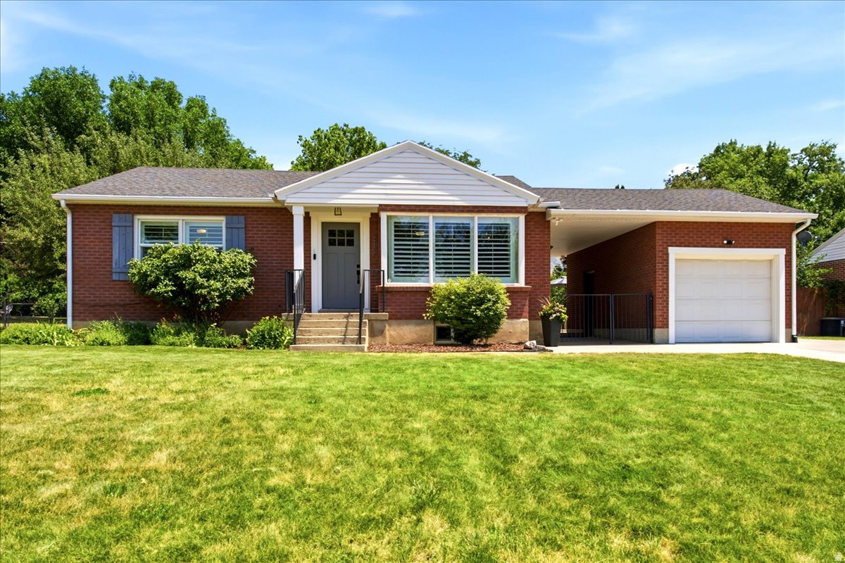 Welcome to this cute, move-in ready 4-bedroom, 2-bath home, ideally situated on a quiet street in the heart of Kaysville and within the highly sought after Davis School District. Situated on a fully fenced .25-acre lot, this property offers a private backyard with a large patio, perfect for entertaining or relaxing. Inside you'll find hardwood floors, updated kitchen featuring knotty alder cabinets, granite counter tops, stainless steel appliances, a gas stove, and refrigerator is included, updated bathrooms, plantation shutters, abundant natural light, generously sized bedrooms, an extra large laundry room with water softener hookups available, and a spacious downstairs family room. The basement offers excellent potential to be converted into a mother-in-law suite or separate living space. The home also features a 1-car garage and RV parking. Conveniently located near Historic Main Street, parks, schools, shopping, dining, Cherry Hill Water Park, and with easy access to I-15 and Highway 89, this home offers the perfect combination of comfort, thoughtful updates, flexibility, and an exceptional Kaysville location. Agent/Owner