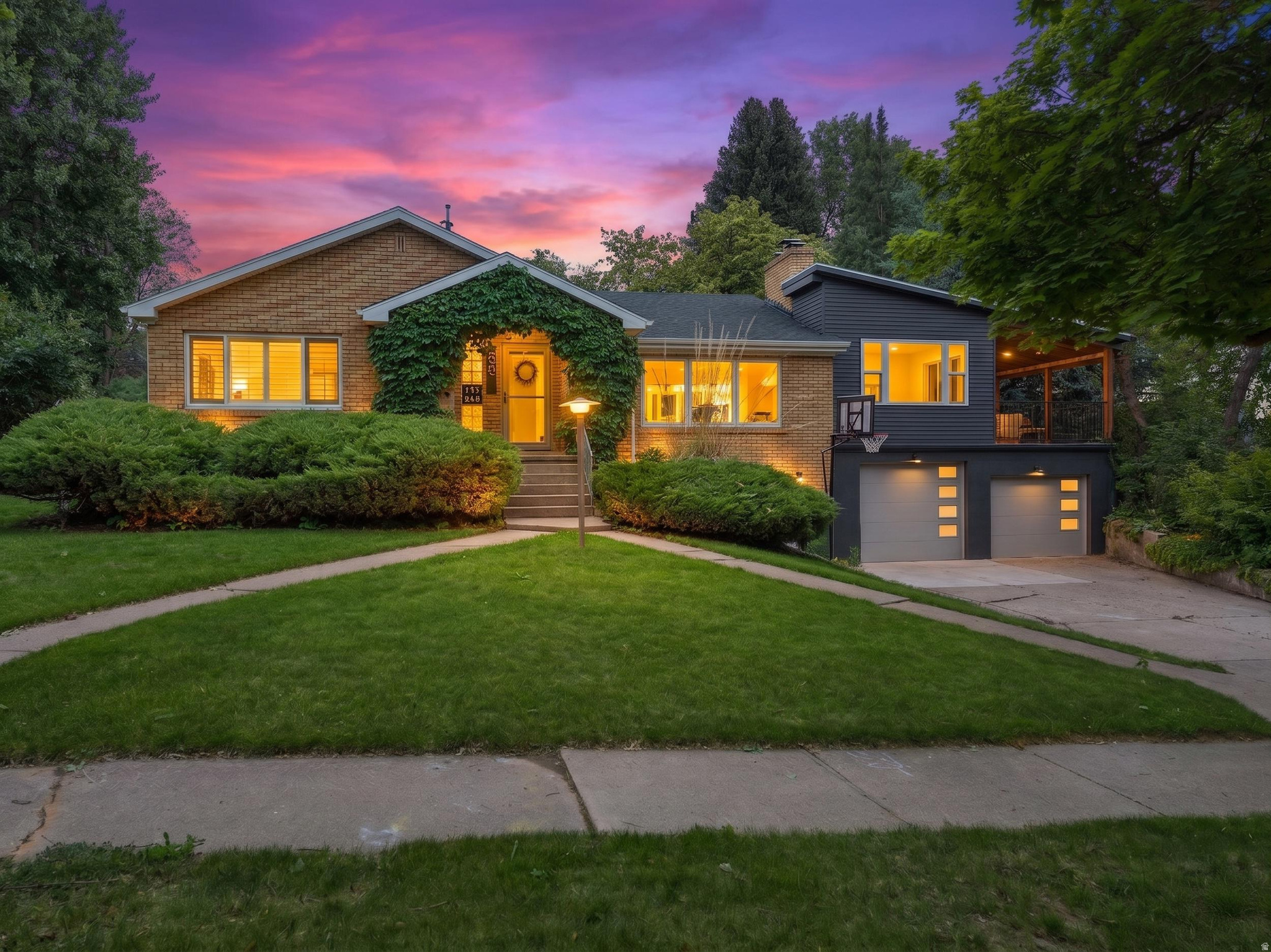 Welcome to this well-maintained basement apartment in a quiet, established residential neighborhood, offering comfortable and functional living with excellent indoor and outdoor features. The unit includes a spacious utility area with concrete flooring, fluorescent lighting, and built-in cabinetry, along with a dedicated laundry space featuring a wood-finish countertop and additional storage. The updated kitchen offers light wood-finish flooring, white cabinetry, and light-toned countertops, while the interior is completed with a well-kept hallway and a bathroom featuring a glass-enclosed shower with a hexagon mosaic tile surround. Outdoor living is a highlight, featuring a wood pergola over a concrete patio and an expansive backyard with a manicured lawn, mature trees, a wooden deck, and mountain views. This property offers a peaceful living environment with practical design and inviting outdoor space. Call today for a private tour!
