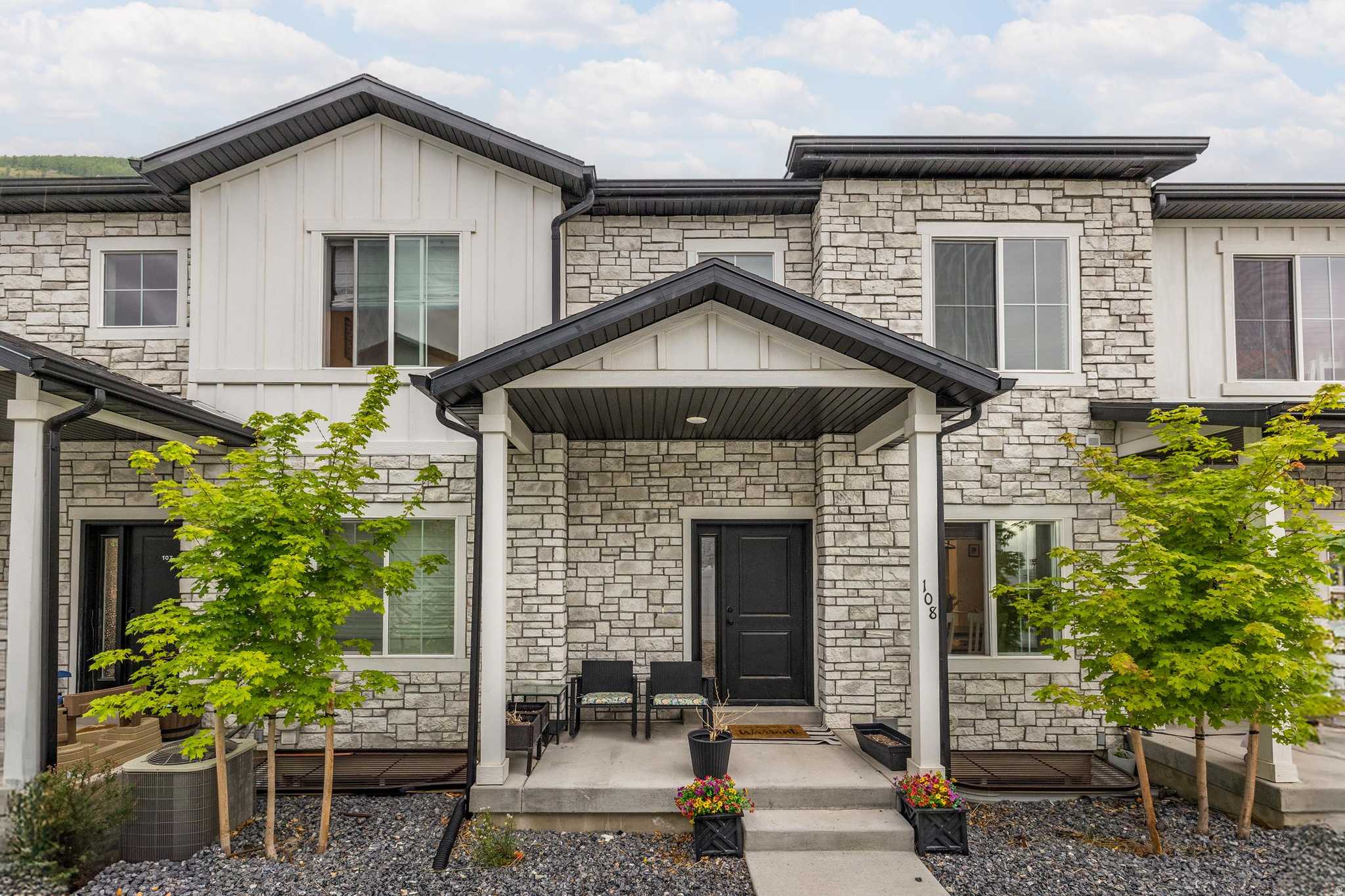 Welcome to this stunning Lexington Townhome in the heart of Tooele! Impeccably maintained and loaded with upgrades, this home offers a bright open-concept layout with soaring 9' ceilings, a spacious 7' kitchen island, 39" upper cabinets, and elegant tile backsplashes. The cozy custom fireplace creates a perfect gathering space, while the high-efficiency furnace keeps you comfortable year-round. The sellers have thoughtfully finished the basement, adding a large bedroom, full bathroom, and an inviting second living room-ideal for guests or a growing family. Outside, enjoy a 10x15 patio for BBQs and relaxation, plus an oversized 2-car garage with an 8' tall door for extra storage or larger vehicles. Located in the sought-after Lexington Greens community with parks, trails, open space, and nearby top-rated schools, including a new high school. Minutes from shopping, dining, entertainment, and easy access to outdoor recreation. This turn-key home truly has it all-modern upgrades, unbeatable location, and move-in-ready condition.