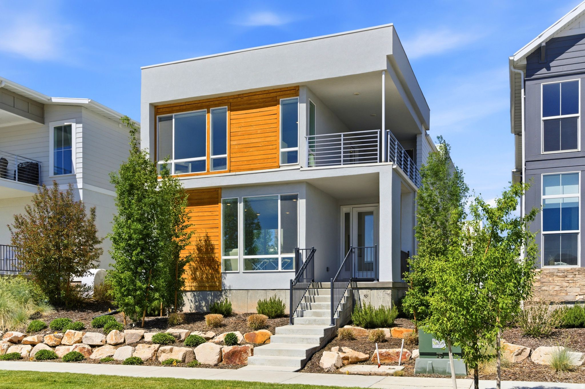 Welcome to a beautifully maintained, like-new home that perfectly blends style, comfort, and functionality. Filled with natural light and designed with modern living in mind, this inviting residence offers open-concept living spaces, expansive windows, and upgraded finishes throughout, creating a warm and welcoming atmosphere from the moment you arrive. The thoughtfully designed floor plan features four spacious bedrooms and three-and-a-half bathrooms, providing flexibility for families and guests. The bright and open main living area serves as the heart of the home, offering seamless flow between the kitchen, dining, and gathering spaces-ideal for both everyday living and entertaining. Downstairs, a generous media/recreation room provides the perfect setting for movie nights, game days, or a home gym. Every space has been carefully designed to maximize comfort, efficiency, and livability. Outdoor living is equally appealing, with a charming main-level patio and garden area that offers a private space to unwind, while the covered upper-level deck provides a comfortable setting to enjoy fresh mountain air throughout the seasons. Additional highlights include an oversized garage, ample driveway parking, and an easy-to-maintain, highly efficient design that allows you to spend less time on upkeep and more time enjoying everything the area has to offer. Ideally situated across from the neighborhood's planned community garden, this home enjoys a wonderful setting within a welcoming, family-friendly community. Residents appreciate the neighborhood's sense of connection, attractive streetscapes, and convenient access to schools, trails, shopping, dining, recreation, and all the amenities that make Park City such a desirable place to call home. This is an exceptional opportunity to enjoy the benefits of a nearly new home in a vibrant community with easy access to everything Park City has to offer.