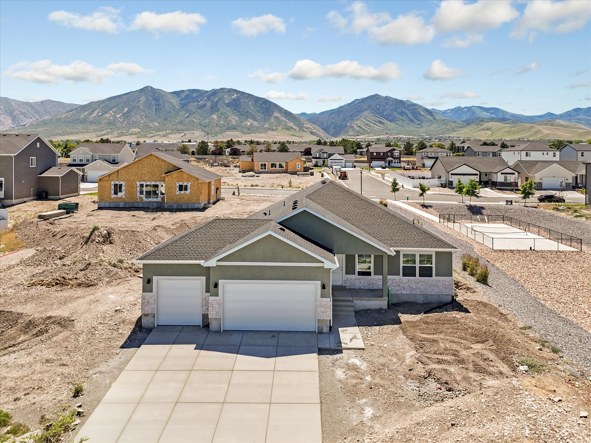 PRICED TO SELL! This is the lowest priced new 3-car rambler on the market in Tooele. The Poppy by WHITESTAR HOMES is an improvement to the classic rambler. The Poppy offers a sense of volume and openness not found in other homes. The heart of the home where life happens and family memories are made is centrally located mirroring natural design. The heart was designed for optimal living through openness with vaulted ceilings that peak at 13' which provides a sense of volume that can accommodate large gatherings or intimate family moments. The ample kitchen, equally important to the life of a home, is situated so that it is both separate and connected to the heart, allowing for a versatility not found in traditional design.  All the bedrooms are vaulted continuing the theme of openness and volume with the Poppy. The ample Primary Bedroom features a separate tub and shower with dual sinks in an open layout that allows occupants peace while preparing for the day ahead. An abundance of clothing is no problem for the large walk in closet to accommodate. The classic jack-and-jill design with the secondary bedrooms provides children and guests with a functional timeless living experience. The Poppy delivers a grand experience within a cozy home unmatched by other options.  Come visit the Poppy today and experience the WHITESTAR difference. *THIS HOME IS UNDER CONSTRUCTION AND ESTIMATED TO BE MOVE-IN READY IN LATE JUNE 2026 **THE INTENT IS TO CONTRACT BEFORE THE HOME IS COMPLETE AND CLOSE AS SOON AS CERTIFICATE OF OCCUPANCY IS ISSUED ***WHITESTAR HOMES IS OFFERING $7,500 IN CONCESSIONS REGARDLESS OF LENDER OR $12,500 WITH PREFERRED LENDER WITH ANY CONTRACT BEFORE THE HOME IS COMPLETED. **PHOTOS ARE OF A POPPY PLAN - THIS SPECIFIC HOMESITE HAS A DIFFERENT COLOR PACKAGE FOR CABINETS/FLOORING/COUNTERTOPS/CARPET.