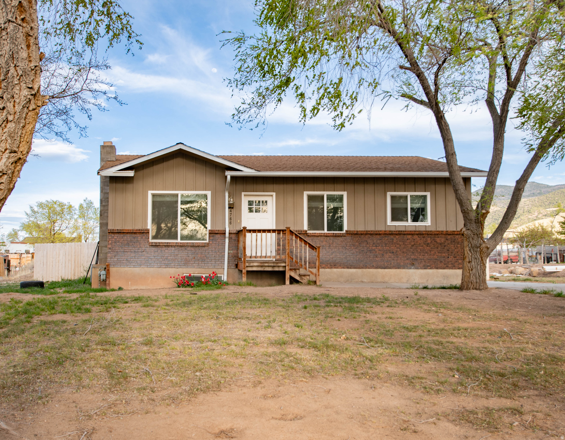 MAJOR PRICE REDUCTION-Seller Motivated! If you're looking for affordable space and privacy? This is it!  Set on a generous lot with mountain views and mature trees, it offers the kind of rural setting that gives you room to breathe and live a little more free. With plenty of space outside for animals or a garden and lots of potential! Inside, the fully finished layout provides separation and function for a growing family-whether that's creating hangout spaces, accommodating guests, or just having a little extra elbow room. With RV parking, a secluded feel, and no HOA, you have the freedom to make it your own. All of this while still being within a short drive to schools and everyday essentials.