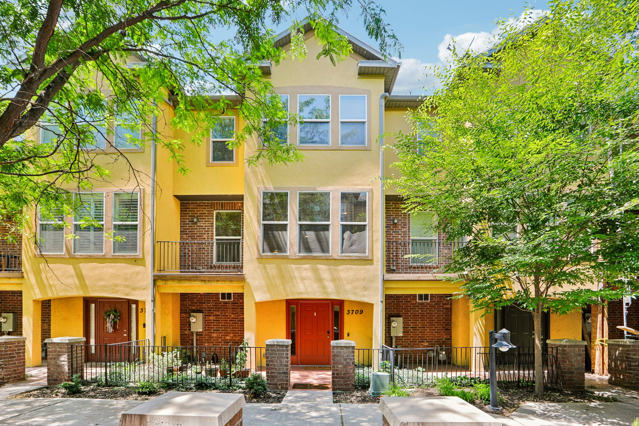 GRAND OPENING | OPEN HOUSE | JULY 18 | 12PM-3PM | This spacious and light-filled townhouse is ideally located in the heart of South Salt Lake, just minutes from the Red Line TRAX station for effortless commuting. Inside, vaulted ceilings and oversized windows fill the open living area with natural light, while engineered hardwood flooring runs throughout the main level for a clean, modern feel. Step out onto the private balcony to unwind, or retreat to the updated master bathroom for a spa-like touch at the end of the day. With plenty of amenities nearby and a location that's hard to beat, this home offers comfort and convenience in equal measure.