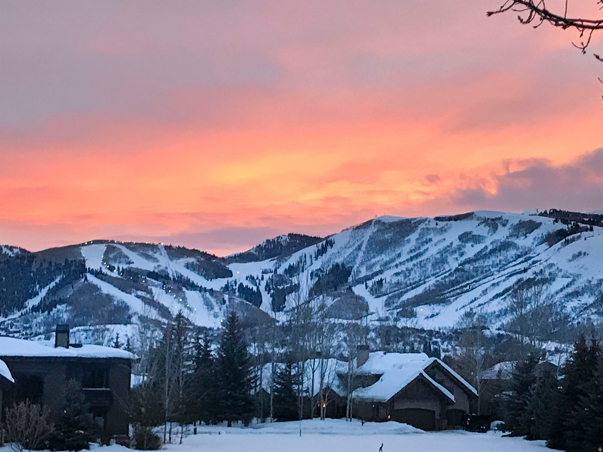 RARE--Direct Ski Run views from the living room, kitchen and 2 of the bedrooms!! Trade the burden of a single family home for the carefree life here! Conveniently located within Park City for easy access to shops, restaurants and Park City activities.  On the coveted ''Gold Coast'' at Four Lakes, it offers panoramic views of the pristine Park Meadows golf course, Mountains and Ski runs. This condo lives like a grand home with the spacious living areas and oversized garage.  With the southern exposure,  soaring vaulted ceilings, skylights and windows, it is flooded with uplifting natural light.  The kitchen granite reflects the colors of the locally sourced exterior natural stone.  The view from the expansive ground floor primary suite is of sweeping fairway views up to Solamere and Aerie as well as the ski runs.  The primary bathroom offers travertine countertops, heated floor, basket weave shower floor and frameless shower door.  Upstairs is an enormous loft for exercise equipment, movie night, or you name it! On this level are two more generous bedrooms with ensuite bathrooms and walk in closets. With so much space, rooms may be added. This home is located across the street from the community pool, tennis and pickleball courts. Amenities are located in the garden area  which is a peaceful place to walk among the stately mature pines, huge aspen trees, native plants and flowers.  Large grassy areas are a fun place for children or dogs to run! Like to road or mountain bike? Just open your garage and ride to numerous trailheads.  With wide streets and more space / privacy between condos, there's no place quite like it.  It is easy to make friends in Four Lakes with casual social gatherings monthly or weekly.  If you prefer privacy, you have it here.  There is so little traffic, it is quiet, peaceful and a safe place to walk.  Select interior images have been virtually staged to illustrate the home's design potential.  Square footage figures are provided as a courtesy estimate only and were obtained from condo documents. Buyer is advised to obtain an independent measurement.