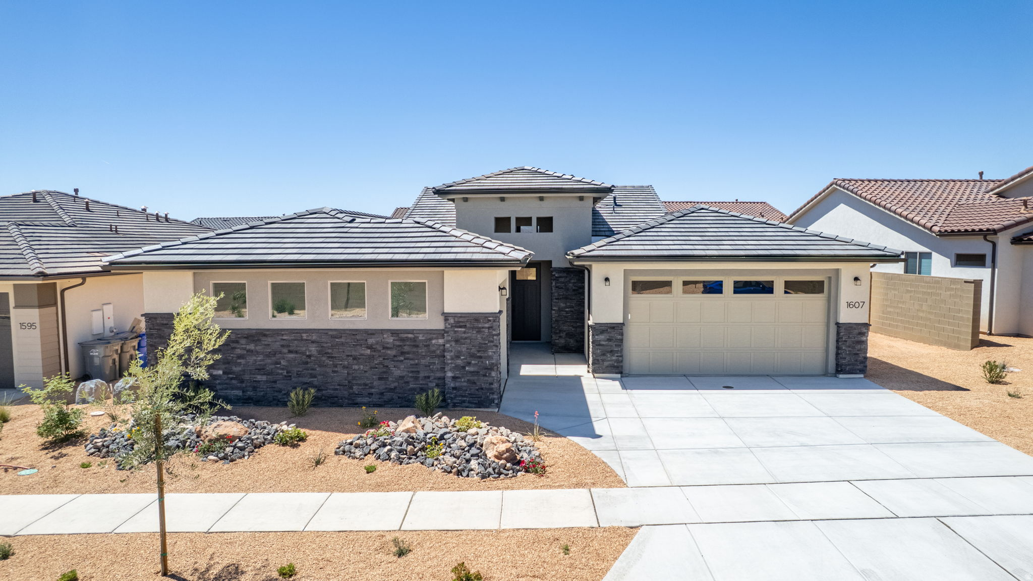 Welcome to the Mesa, a stunning 4-bedroom, 3-bathroom home that spans 2,350 square feet of beautifully designed living space. This floorplan features a spacious kitchen with optional gourmet enhancements, perfect for your culinary endeavors. A large, three-panel multi-slide door can be added, extending your entertaining area right off the main living room and seamlessly blending indoor and outdoor spaces. The primary suite includes a luxurious ensuite bathroom, adding to the home's allure. With a convenient 2-car garage and access to the vibrant SOLIS community's resort-style amenities, including a pool, spa, and recreational courts, you can enjoy an active and fulfilling lifestyle in this remarkable home.