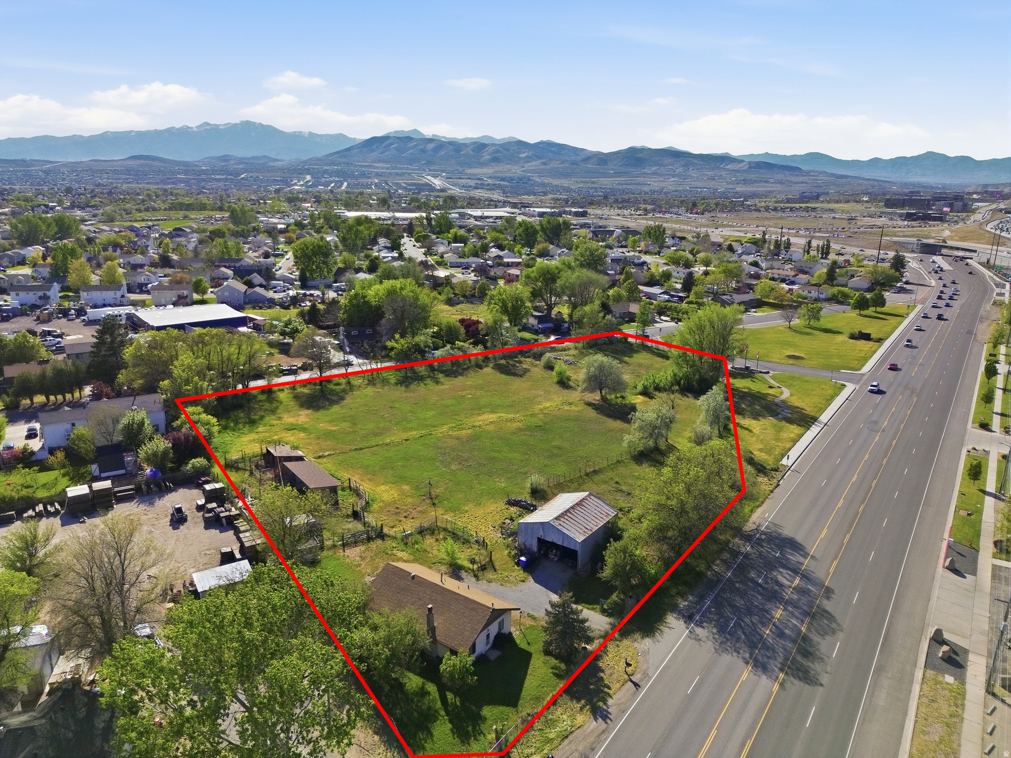 Opportunities like this in Lehi don't come around often. This rare multi-acre property sits directly on high-visibility State Street and is currently in the process of being rezoned to heavy commercial-aligned with the city's master plan for future growth. Located in the heart of the thriving Silicon Slopes corridor, this flat, usable parcel offers exceptional potential for developers, investors, or owner-users looking to establish a presence in one of Utah's fastest-growing commercial hubs. With limited large-acreage sites remaining in this prime location, this is a hard-to-find gem with unmatched exposure, accessibility, and long-term upside.