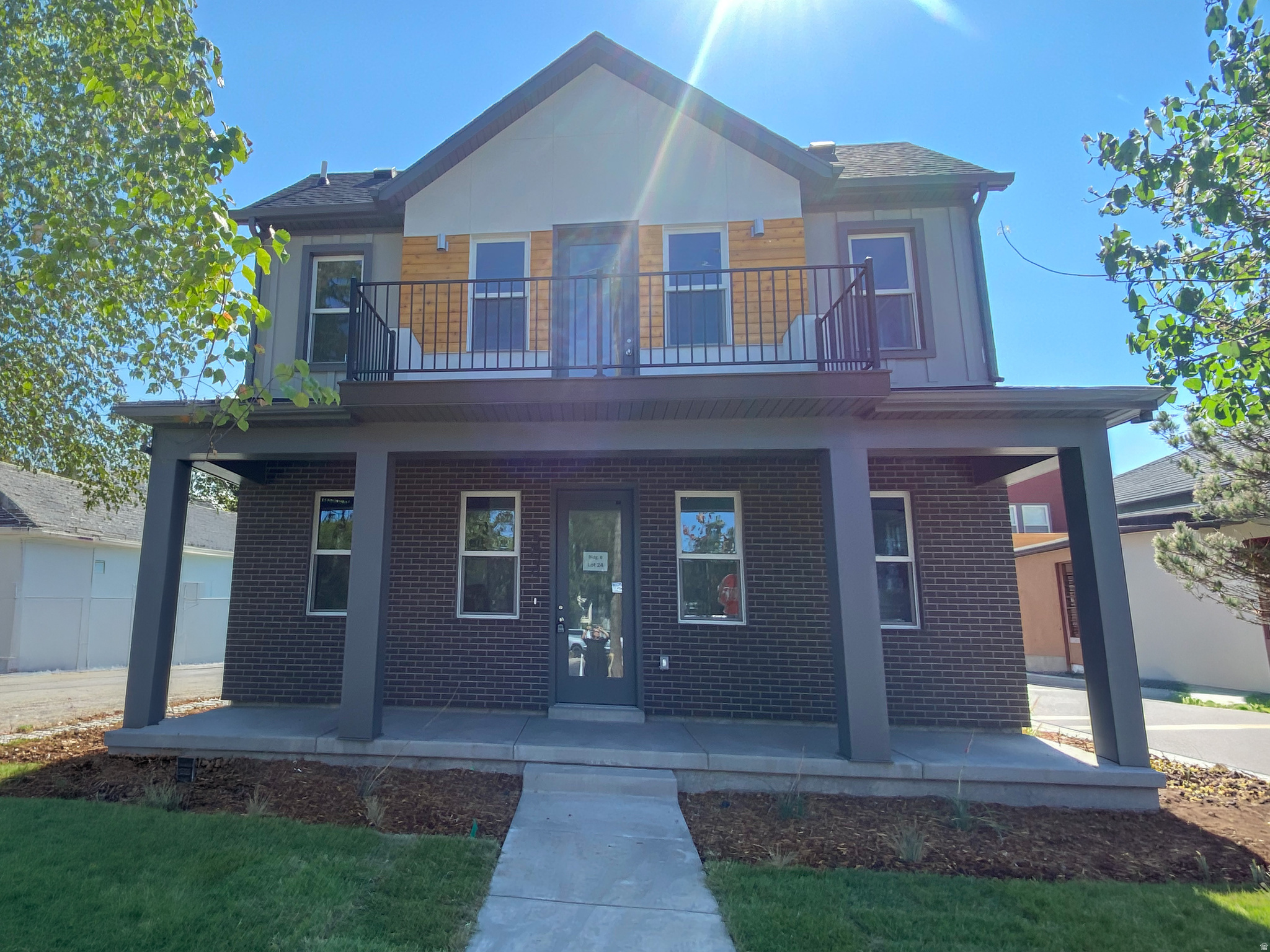 UP TO $35,000 IN SAVINGS available in this community! Location! Location! Location! Welcome to Bishop Place, perfectly situated in Salt Lake City's highly sought-after Marmalade District-one of the city's most charming, walkable, and vibrant neighborhoods. Just steps from cozy local cafs, the Marmalade Library, the Delta Center, Pioneer Park, and lively downtown streets, this home offers true urban living with unbeatable convenience. Enjoy quick access to City Creek, Temple Square, The Gateway, I-15, I-80, and Salt Lake International Airport just 10 minutes away. This brand-new Garbett Homes townhome presents a truly rare opportunity, featuring the most sought-after floor plan in the community-with only one ever built. Thoughtfully designed with both style and function in mind, this unique home offers a spacious front porch that spans the full width of the home plus an oversized west-facing deck-perfect for relaxing, entertaining, and enjoying gorgeous summer sunsets. Inside, the layout offers a refreshing sense of space with a separated living area and kitchen, creating a distinct and functional flow that feels both open and intentional. Tons of natural light pour through abundant windows thanks to the highly desirable southern and western exposure, creating a bright, warm, and inviting atmosphere throughout the day. Built for modern living and greater efficiency, this home includes Solar-E windows, advanced insulation, whole-home air recirculation, on-demand hot water, and a private 2-car garage with EV charging capability. Designer finishes elevate the interior with quartz countertops, beautiful tile details, and durable low-maintenance vinyl flooring that blend style with everyday practicality. Upstairs, the primary suite offers a peaceful retreat, while the downstairs bedroom with its own full bathroom provides exceptional flexibility-ideal for guests, a home office, roommate setup, or multi-generational living. Backed by a full builder warranty, this brand-new home offers confidence, efficiency, and a rare opportunity to own one of the most distinctive homes in Bishop Place.