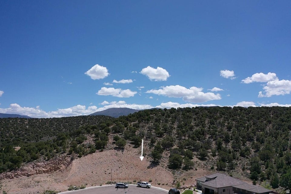 Rare .29-Acre Custom Estate Site in Hidden Hills Cove Discover the ultimate blend of seclusion and convenience on this sprawling .29-acre building lot. Tucked into a quiet cove with panoramic mountain views, enjoy a serene ''out in the country'' feel just minutes from downtown Cedar City and Walmart. Bring Your Own Builder: High-flexibility site for your custom dream home. Ready to Build: All utilities stubbed to the lot for a turn-key new construction start. Protected Value: Located in a peaceful neighborhood with established CC&Rs. Prime Location: Massive acreage providing total privacy without sacrificing proximity to city amenities.Don't just buy a house--build the view you deserve in Cedar City's most sought-after location.