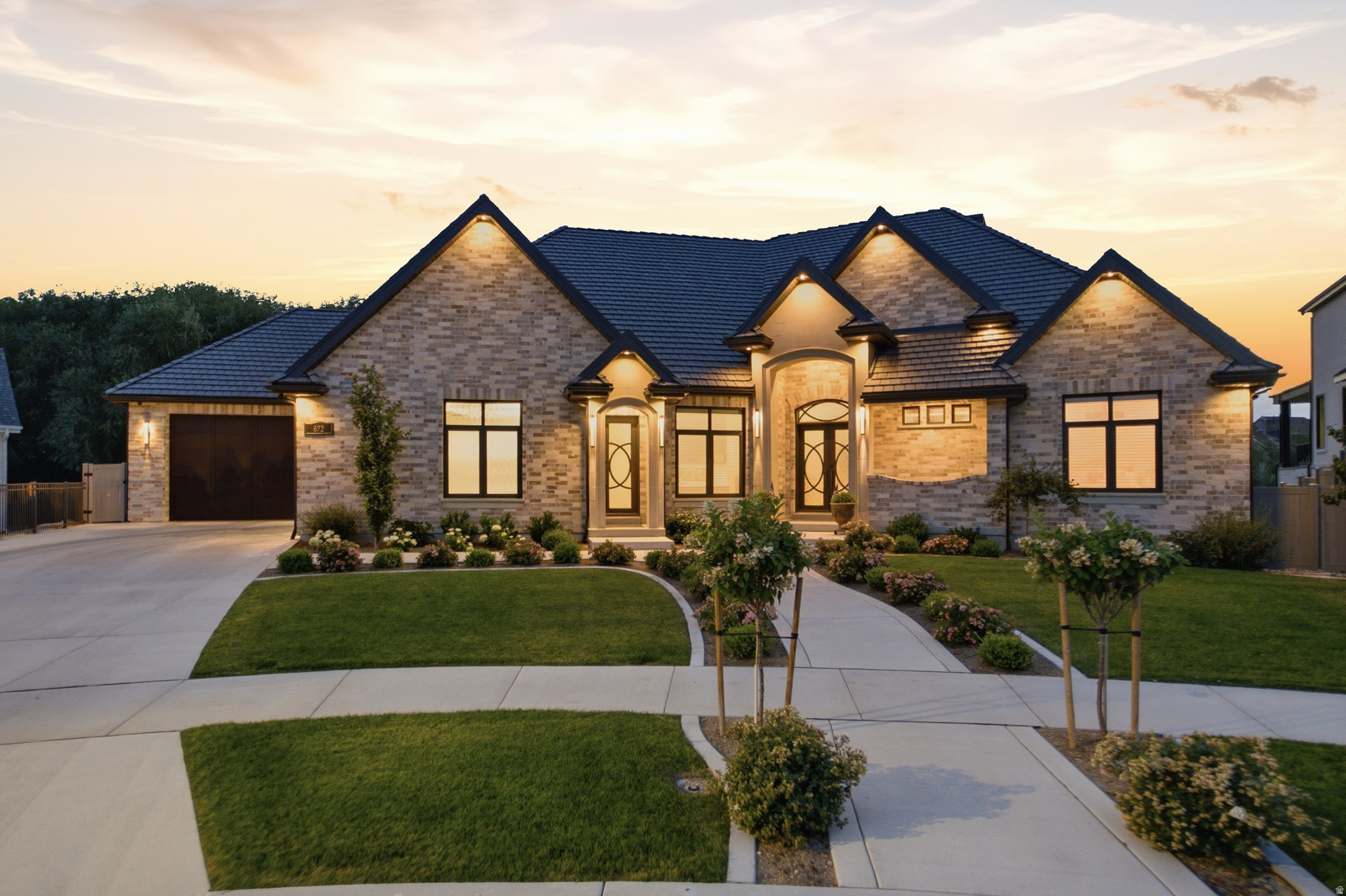 Nestled on a quiet cul-de-sac bordering Greenwood Creek with stunning mountain views, skip the build process and step into this 10,000+ sq. ft. multi-generational masterpiece. Engineered for ultimate luxury, this Universal Design estate features two primary main-level suites plus a bedroom ensuite, custom woodwork throughout, heated bathroom floors, spacious covered deck/patio with ceiling heaters to name a few extras. Perfect for guests or extended family, the fully finished daylight basement functions as a premium accessory apartment with a separate walkout entrance and its own kitchen. Highlights include 6-car epoxy garage with a 14-ft RV door and 3 EV outlets-plus dual chef's kitchens with 6cm Taj Mahal Quartzite, an indoor sports court, theater room, and Bullfrog swim spa. Backed by elite infrastructure (3 HVACs, dual-generator wiring, Cat 6, whole-house filtration, 2 central vacuums and 4 fireplaces), this home offers over $500k in premium upgrades. Experience the grand scale in person-schedule your tour today! Owner/Agent.