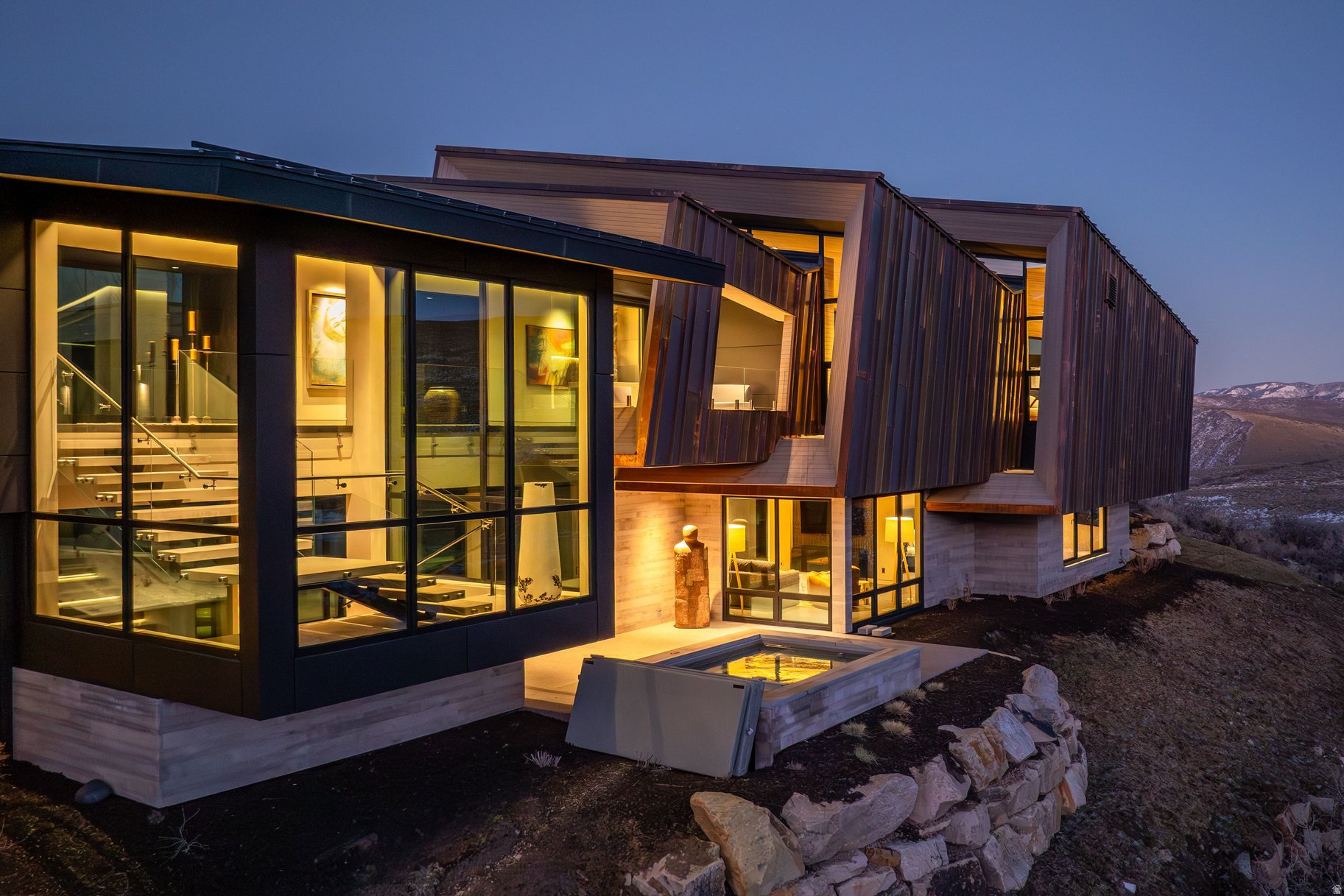 Slow Time Through Awe...and Golf. Earthy and uber-modern, this 2026 Upwall Design / McGinnis-build is found at the end-of-the-road on an extra quiet cul-de-sac in Promontory's almost completely built-out ''50-yard line'', Aspen Camp. This home is centrally located to all of the club's amenities. Aspen Camp's east-facing aspects harbor moisture, hence naturally grow oaks, aspens, and other non-sagebrush vegetation not found on the busier and hotter, western aspects of Promontory. Sunrise, Uinta, and up-close wildlife views abound on this acre lot adjoining the xc-ski/hike/bike Lady Di trail. The thoughtful downhill design affords convenience and privacy. Approximately 8,196 finished sq ft, 4.5 bd, 7 ba, 2 levels, 2 laundries, butler's kitchen, etc., create cozy luxury of unmatched quality. This is a new-build, but not a spec home, offered turn-key. State-of-the art appliances/electronics include: Gaggeneau, SubZero, Wolf, Miele, Dorn Bracht, Brizo, Crestron, Lutron, Ecobee, Samsung, and LG. All the HVACs. Promontory Golf Membership available.