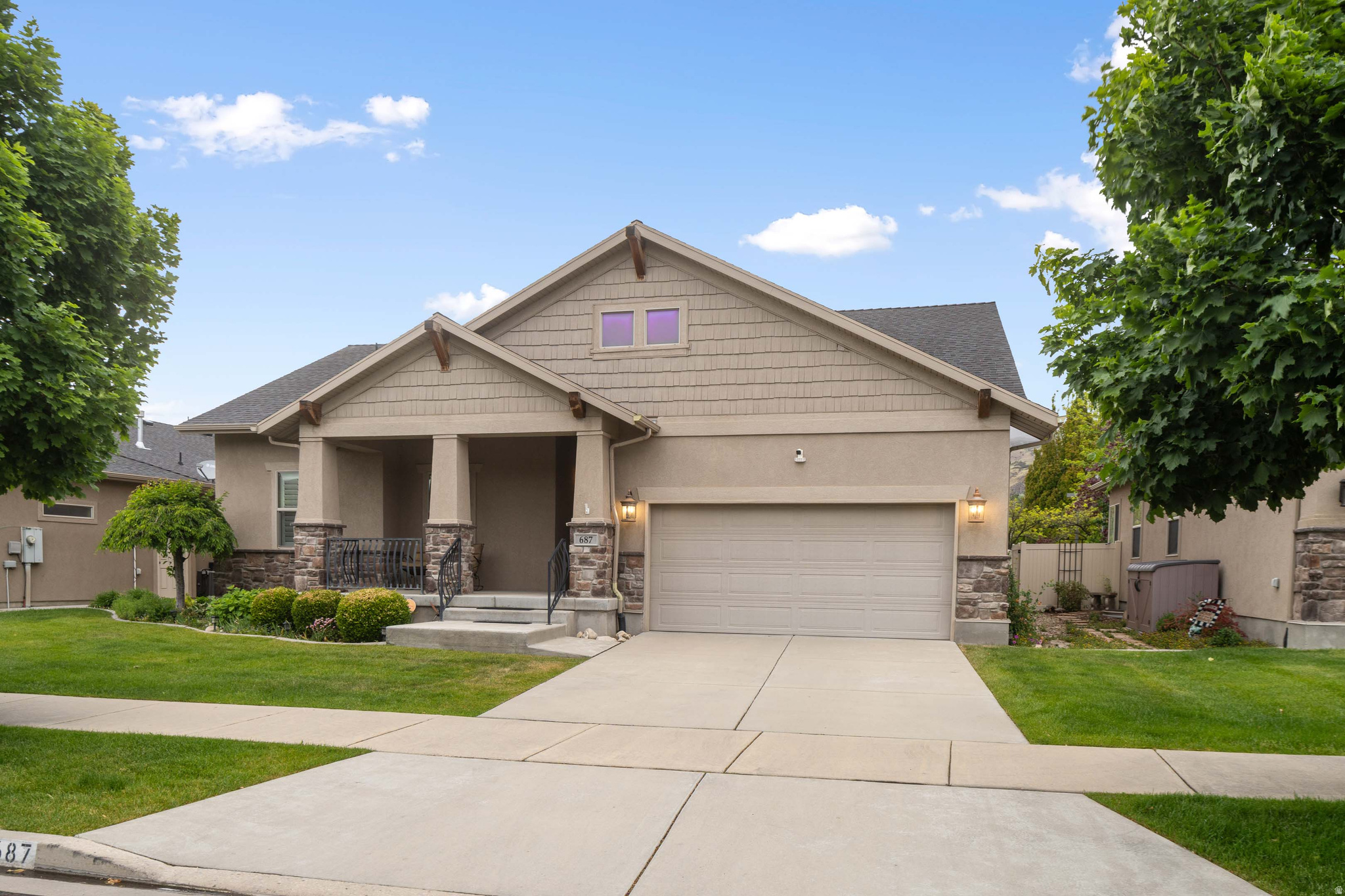 Welcome to the highly sought-after Da Vinci 55+ Community in beautiful Orem! This beautifully maintained single-family home offers comfort, convenience, and peaceful living in one of the area's most desirable active adult neighborhoods. Enjoy stunning views of Mount Timpanogos right from your home and yard, creating the perfect mountain backdrop year-round. Inside, you'll find spacious living areas designed for easy living and entertaining, including a fully finished basement complete with a wet bar - perfect for hosting family and friends. This thoughtfully designed home also features a spacious 2-car garage, cold storage, a beautifully landscaped yard, and a Vivint security system for added peace of mind. Located in a quiet, well-maintained neighborhood, residents enjoy community outdoor amenities including picnic areas and inviting gathering spaces that make it easy to enjoy the peaceful surroundings and connect with neighbors.  Conveniently located near shopping, dining, and everyday essentials, including Harmons Grocery, this home offers the perfect blend of tranquility, security, and accessibility. Whether you're looking to downsize without compromising on comfort or seeking an active, low-maintenance lifestyle with beautiful mountain views, this exceptional Da Vinci home is a must-see! The home also has a Radon Mitigation system.