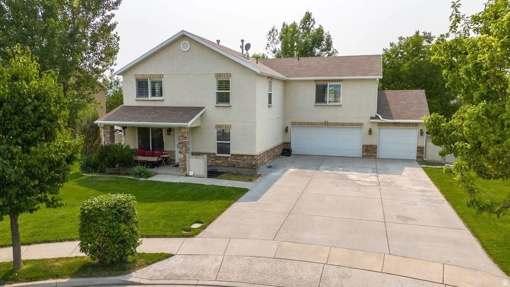 Beautifully maintained home tucked away on a quiet cul-de-sac in the heart of Lehi with breathtaking mountain views. Featuring bright, open living spaces and spacious gathering areas, this home offers comfort and functionality throughout. Step outside to a beautifully landscaped backyard retreat with mature trees, full fencing, lush lawn, and a covered pergola patio ideal for relaxing or entertaining. The large lot provides plenty of room for outdoor activities, gardening, pets, or future customization. New Roof in 2025, newer AC & dual thermostat, spacious 3-car garage plus extended driveway parking. Ideally located near Thanksgiving Point, Silicon Slopes, Traverse Mountain shopping, parks, trails, restaurants, and quick I-15 access.  Sold as-is, but in great condition.