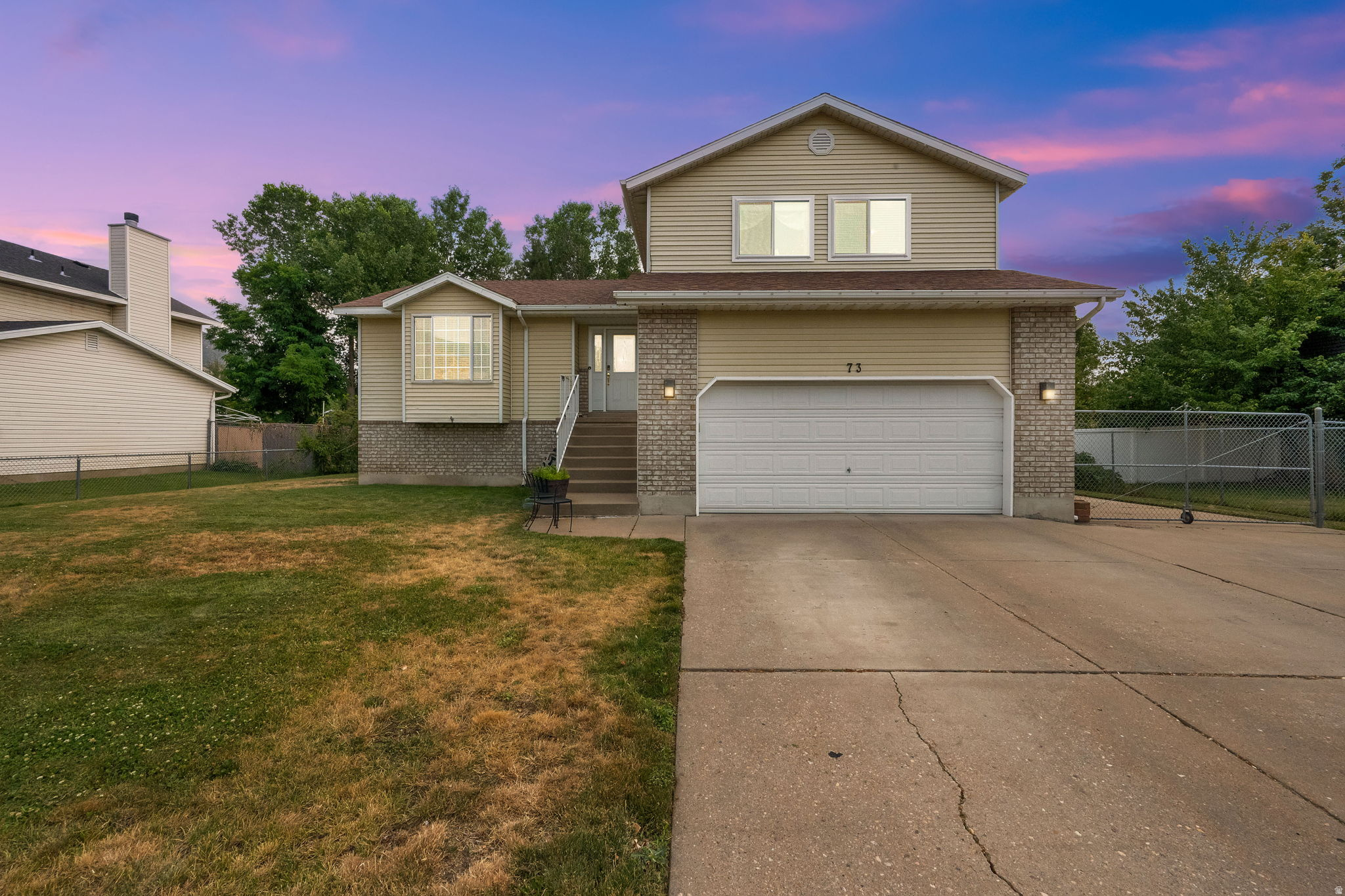 Beautifully maintained home in one of Farmington's most sought-after neighborhoods! Ideally located east of the freeway, this home backs directly to South Park, offering unobstructed mountain views and added privacy with no rear neighbors. The current owner has made numerous updates, including new flooring throughout the home, while major systems-including the roof, furnace, and central A/C-have all been replaced within the last seven years. Enjoy exceptional energy efficiency with a fully paid-off solar system, keeping the average monthly power bill at approximately $12 with no solar payment to assume. The property also includes secondary water for irrigation, providing additional utility savings. Inside, you'll find high-speed internet wiring, a home security system, a water softener, reverse osmosis drinking water tap, a walk-in tub in the primary bathroom, and both gas and electric hookups for the dryer and kitchen range. The kitchen features a Viking gas range and built-in ice maker, perfect for cooking and entertaining. Permanent exterior lighting adds year-round curb appeal and convenience. The partially finished basement already includes one completed bedroom and offers additional space ready for your finishing touches. Conveniently located just minutes from shopping, dining, schools, and freeway access, this home offers the perfect combination of quality updates, energy efficiency, breathtaking views, and an unbeatable location.