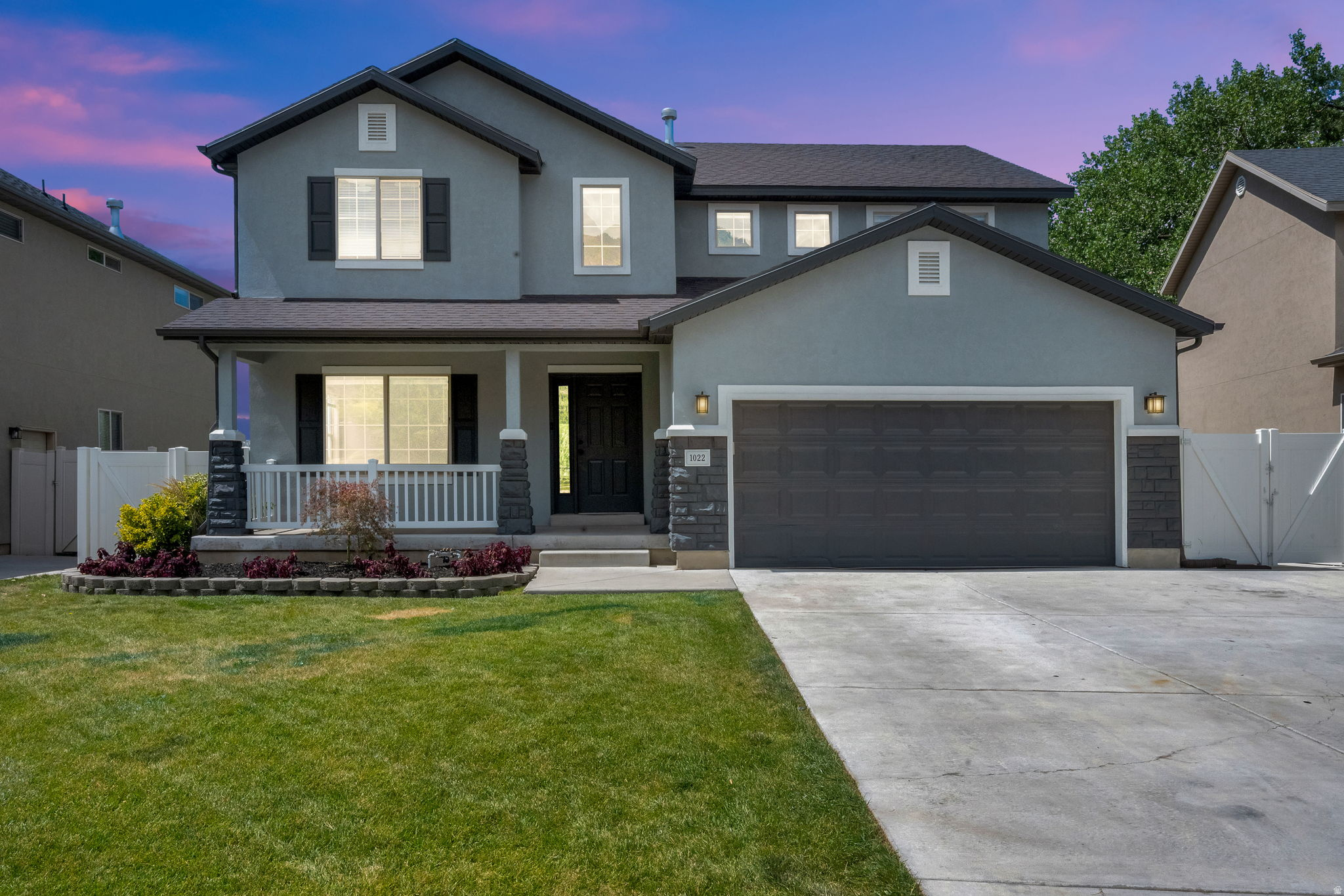 WELCOME HOME!!! When you see the mountain view from the front porch, you'll know you're home. It's absolutely stunning! Join us at the open house this Saturday, 3-5 pm, and claim this beauty immediately because it won't last long. New paint. New carpet. Fabulously newer large deck with access to the yard. Primary has dual sinks and jetted tub. Finished garage walls and epoxy'd floor. Clean windows. Professionally cleaned top to bottom, inside and out. Private basement entrance. Widened driveway. Fully landscaped and fenced. Views. Views. Views. Being steps from "the pit" (community open area) is ideal for your children to join the others...or...for you to practice chipping (golf)....because you're close enough, yet also far enough. :-) The Sellers didn't wear shoes in the home and ask you to remove or cover yours. This home is ready for you to imagine where your furniture and decor will go. Again, welcome home!