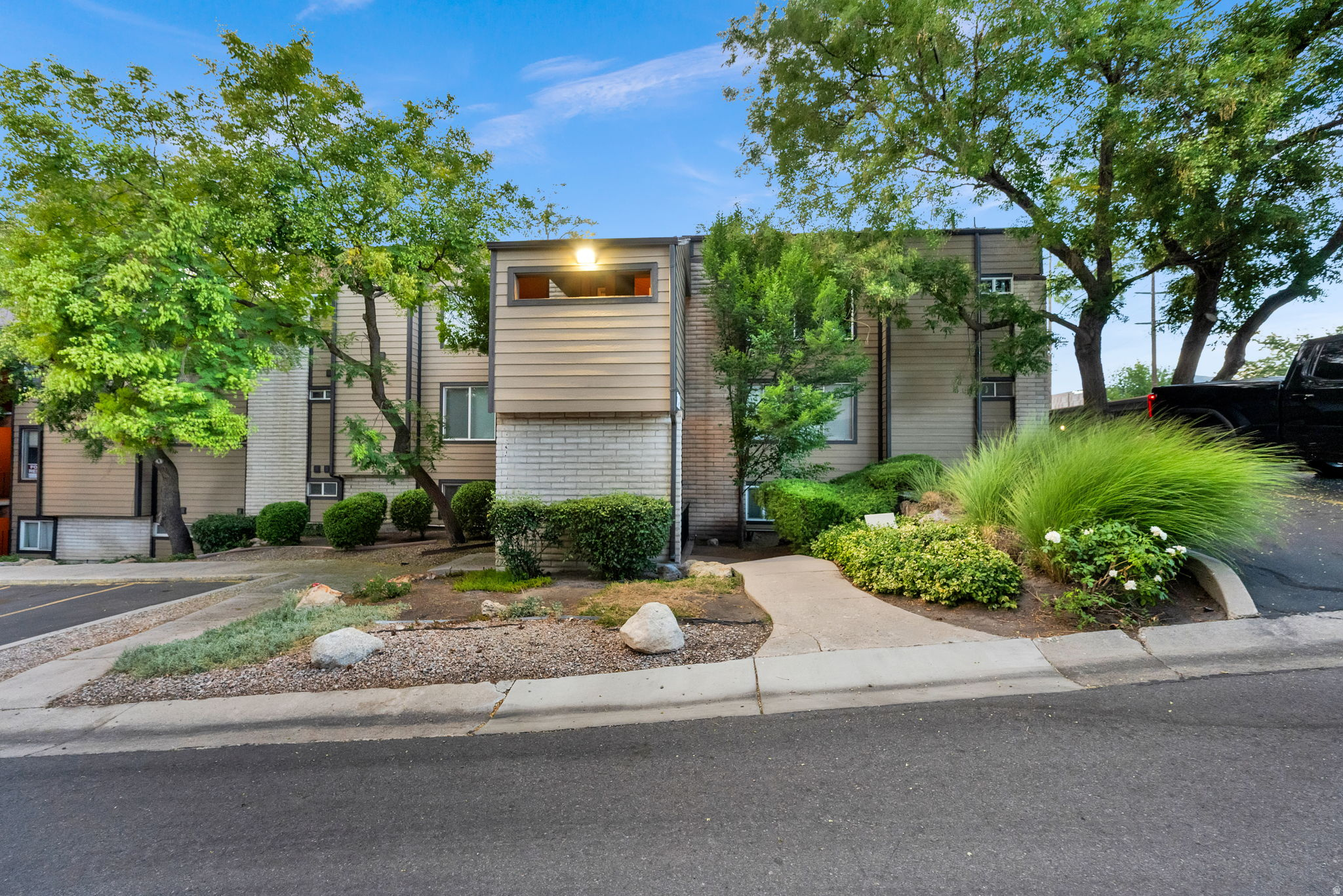 Main level condo located in Salt Lake City with easy access to i80 without the noise. Large family room, dining area, and an updated kitchen with quartz countertops, full size french door stainless steel refrigerator, over head microwave, plenty of cabinet storage, and a large picture window that looks out over the courtyard. One bedroom and one updated bathroom with tile surround shower and a rare in-unit stackable washer and dryer. Assigned carport with a locked storage closet, and visitor parking close by. Water, sewer, and trash are included in the HOA, which the owner pays. Tenant pays for electricity and gas and must have renters insurance policy. Newer windows, newer HVAC, and water heater. Truly move-in ready and easy to maintain. Pets are accepted on a case by case basis. If accepted, $75 per pet/monthly plus a $750 per pet deposit that is fully refundable.