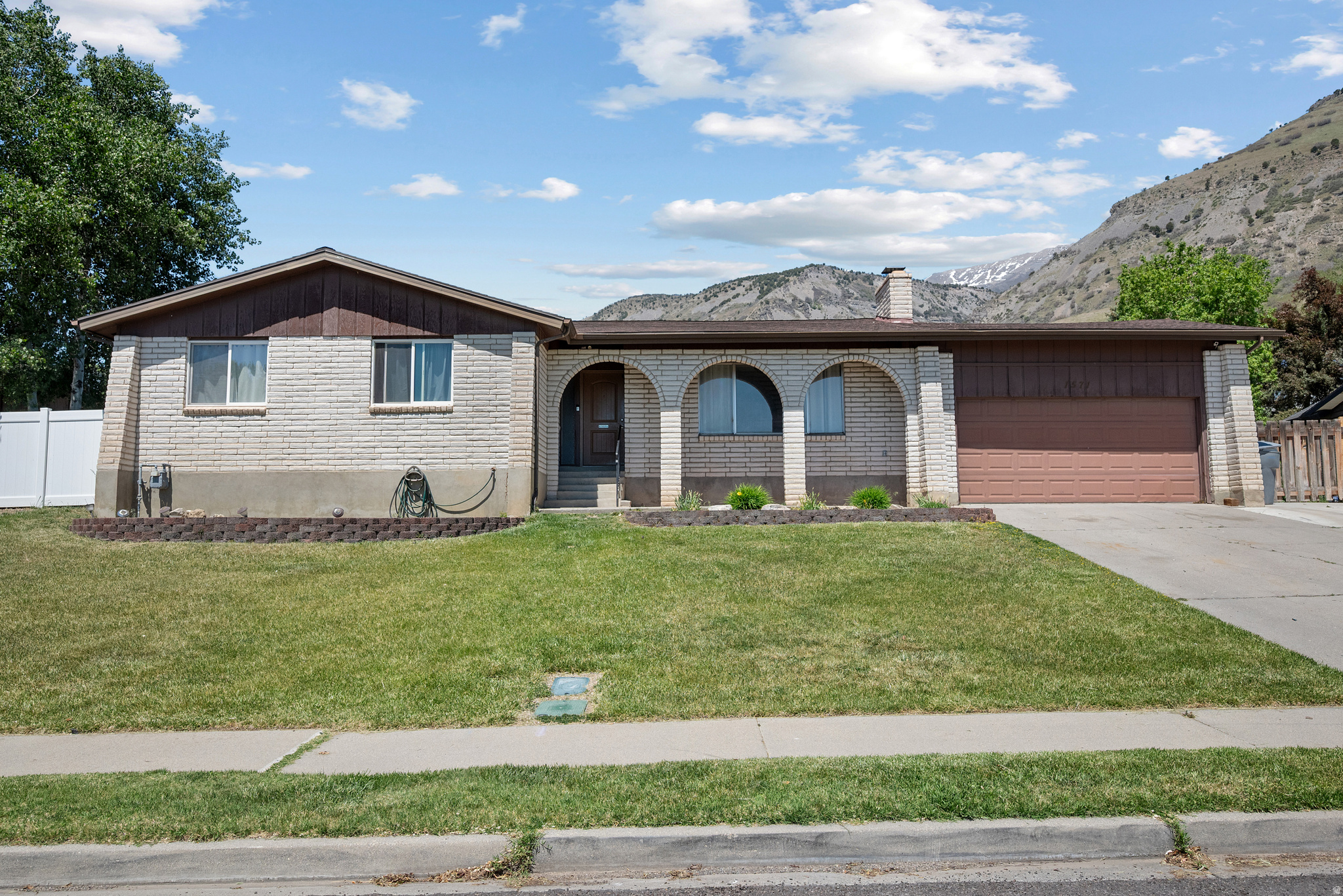 Stunning Pleasant Grove Foothill Home with Incredible Mountain, Valley & Utah Lake Views! This beautiful one-level home sits on .24 acres in a quiet, highly sought-after neighborhood and offers the perfect combination of comfort, space, and breathtaking scenery. Enjoy panoramic views from the huge backyard, perfect for entertaining, relaxing, and taking in unforgettable sunsets. Featuring 4 spacious bedrooms and 3 bathrooms, this home offers an open and inviting floor plan with plenty of natural light throughout. The large and beautiful master suite provides the perfect private retreat. The home also features two living rooms, with one currently being used as a bedroom and separated by a temporary wall that can easily be removed by the new owner. Located near nature, trails, and all the conveniences of Pleasant Grove, this rare foothill gem is a must-see and won't last long!