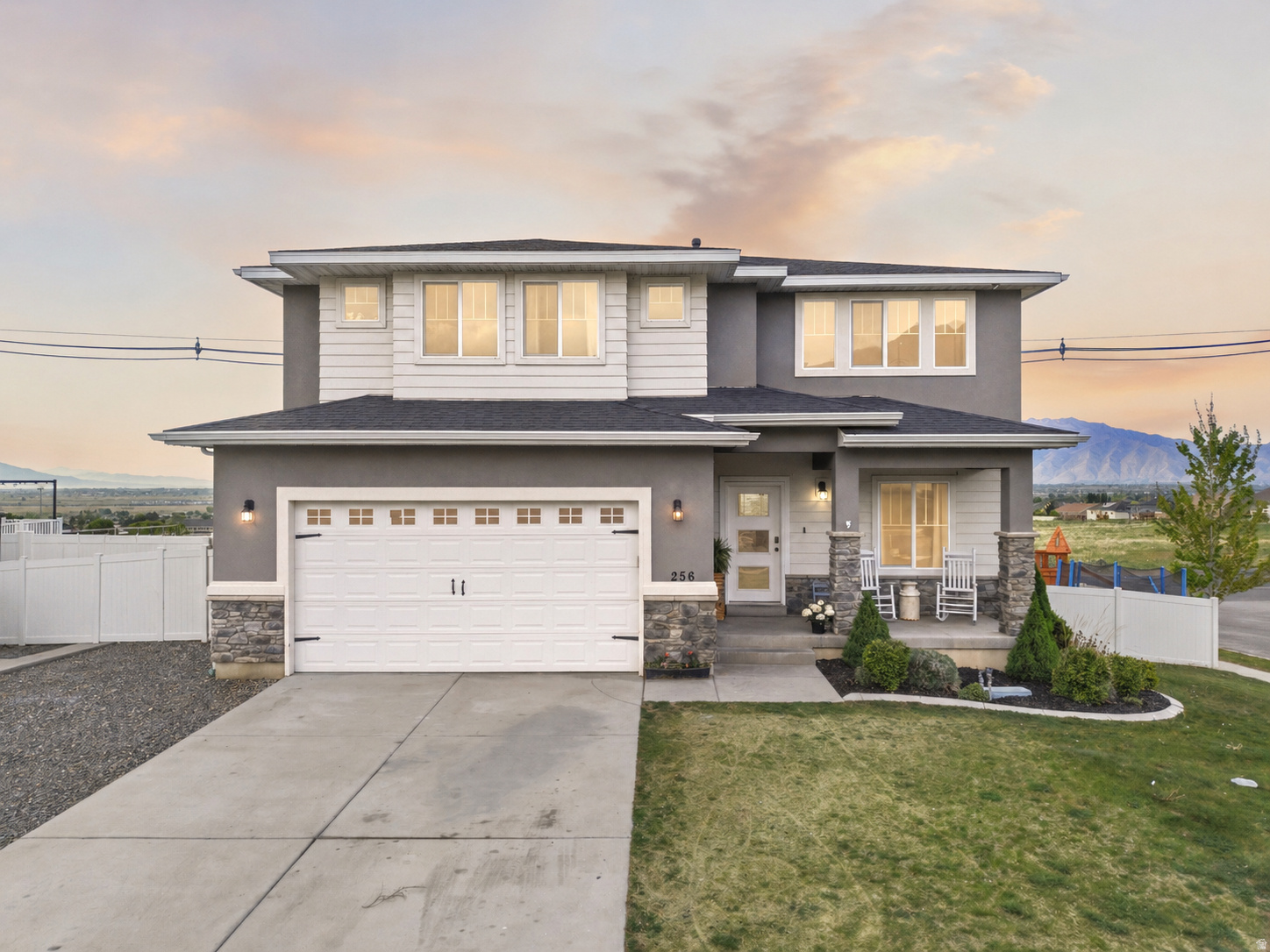 Stunning Elk Ridge view home on a corner lot featuring 4 bedrooms, 2.5 bathrooms, and unobstructed valley views with no backyard neighbors. This well maintained home offers a functional open floor plan with a main level office/flex space, spacious living areas, and upgraded finishes throughout, including custom lighting and permanent Gem exterior lighting.  The kitchen flows seamlessly into the dining and living areas, perfect for everyday living and entertaining. Upstairs you'll find a large primary suite with incredible views, a walk-in closet, and a private bath, along with additional bedrooms and a versatile loft space.  Enjoy outdoor living on the back deck overlooking the valley, plus a fully fenced yard offering privacy and space. The walkout basement provides excellent potential for future living space, rental opportunity, or additional storage.  Located in a desirable Elk Ridge, Utah neighborhood near walking trails, parks, and just minutes from shopping, schools, and commuter routes. Rare opportunity to own a view home with privacy in Utah County. Buyer and Buyer agent to verify all information provided.