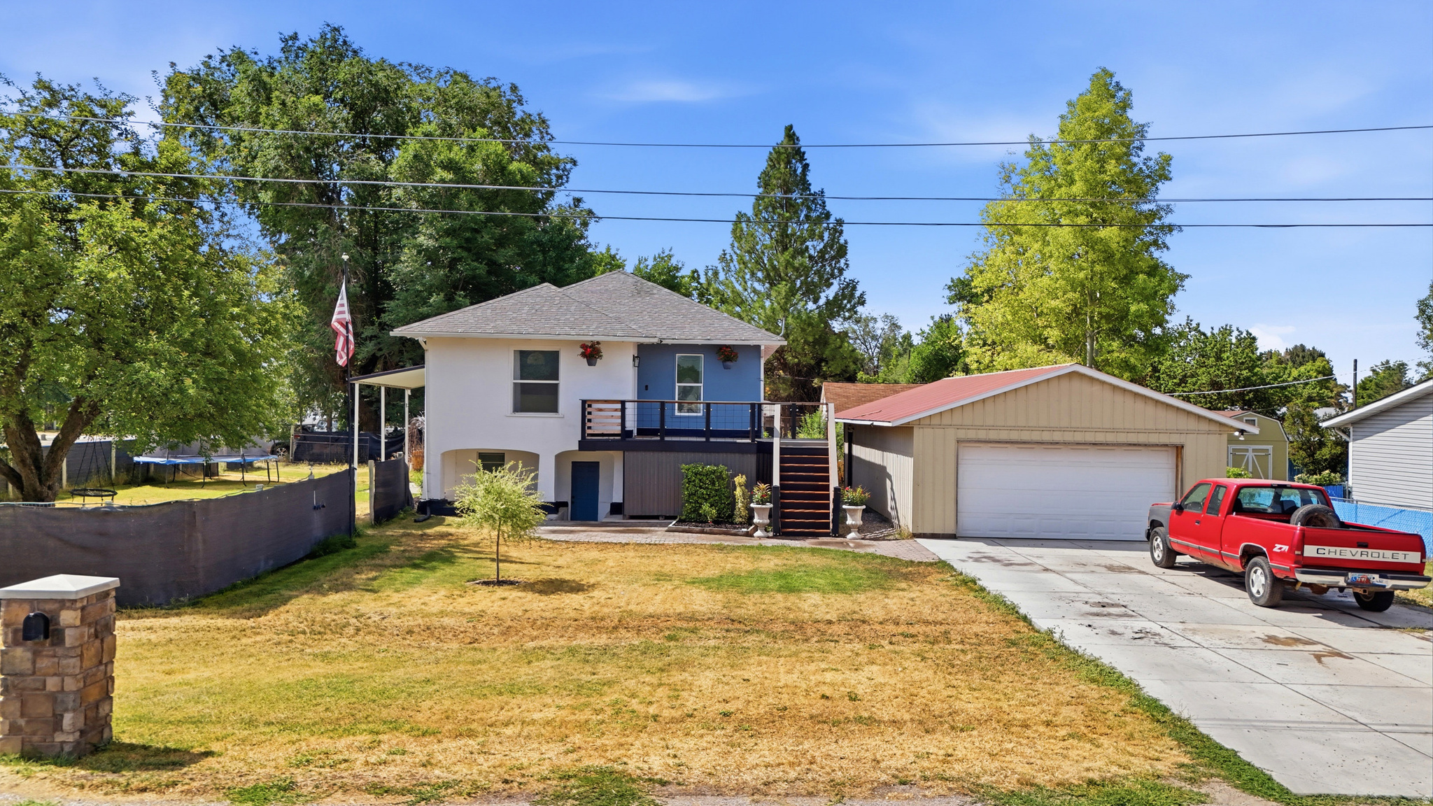 You will love this large .55 corner Lot with mature shade trees. Room to garden, or have chickens. Unique Style, high ceilings, spacious room sizes. Darling updated kitchen and bathrooms plumbed, new flooring. Awesome deck!  The Walk out basement would be great for rental, home office or mother in law apartment. Super sized double car garage. Loads Of potential! Close to schools and shopping. Come take a look!