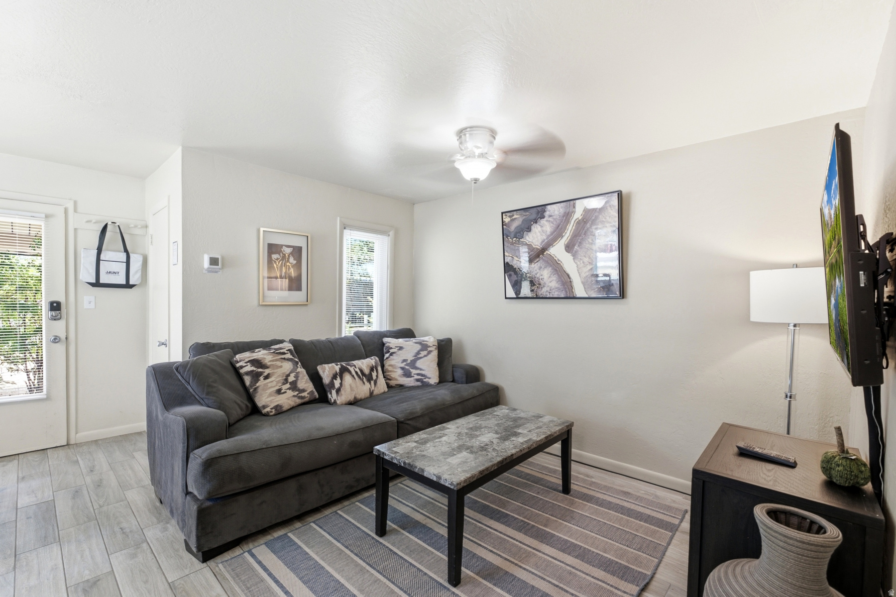 Super convenient location for this 1BR/1Ba, 510 SF COMPLETELY updated/remodeled Claimjumper.  Main level, no-step entry, corner unit was completely updated 4 years ago including granite counters, stainless appliances, new windows (2 years ago).  Perfect for a primary residence or vacation rental (STR) with an in-unit washer & dryer.  Assigned carport means no shoveling off your car in the winter and a cool interior in the summer.  Walk to Smiths, Walgreens, and on FREE bus shuttle route.  No PETS.