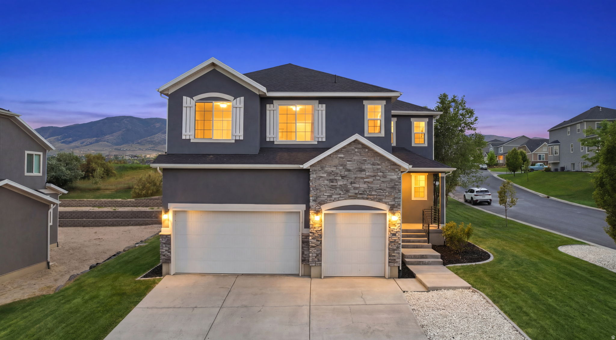 Located in the gated Ironwood community, this fully finished 2 story home sits on a desirable corner lot just steps from Utah Lake and TalonsCove Golf Club. Inside you'll find an open layout with a gourmet kitchen, 10' granite island, stainless steel appliances, loft, and spacious primary suite. The fully finished basement features a separate entrance, full kitchen, bedroom, bathroom, and laundry hookups, ideal for guests, multi generational living, or extra entertaining space. Enjoy lake, mountain, and golf course access in one of Saratoga Springs' most desirable neighborhoods. Square footage figures are provided as a courtesy estimate only. Buyer is advised to obtain an independent measurement.