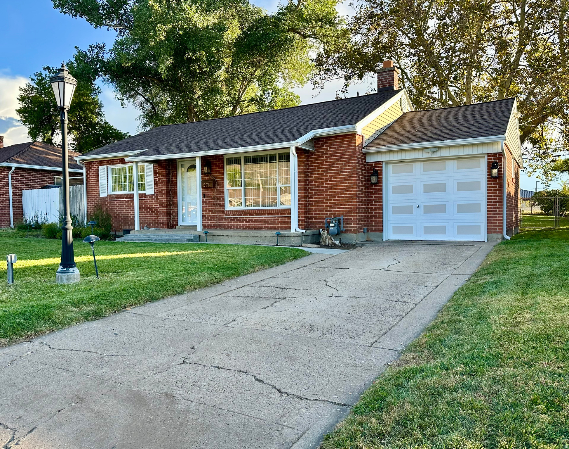 Owned by the same owners for over 40 years and has been cared for and loved. -Single Family Home -Built in 1951 -918 Square Feet -9,583 Square Feet Lot -2 Bedrooms One Bathroom -One Car Garage -Central Air -Roof was completely redone a couple years ago. -Newer rain gutters with guards -Gen-Tron Panel for generator -Surge Protected (entire house) -Two outdoor storage sheds -Attic Storage above garage -Outdoor lighting timer -50amp 240v & 30amp 240v receptacles in garage (welders, compressors, RV, etc) -Fenced in backyard -All one level except for two different stairs. The living room, hallway, and two bedrooms are offered without finished flooring. Original hardwood floors are present and will require refinishing or covering. The front entry, kitchen, bathroom, and laundry room feature matching tile flooring. Property is being sold AS-IS. Ideally located near shopping, dining, and daily conveniences, just minutes from two hospitals. Located in a desirable school district, making this home both practical and well-situated.