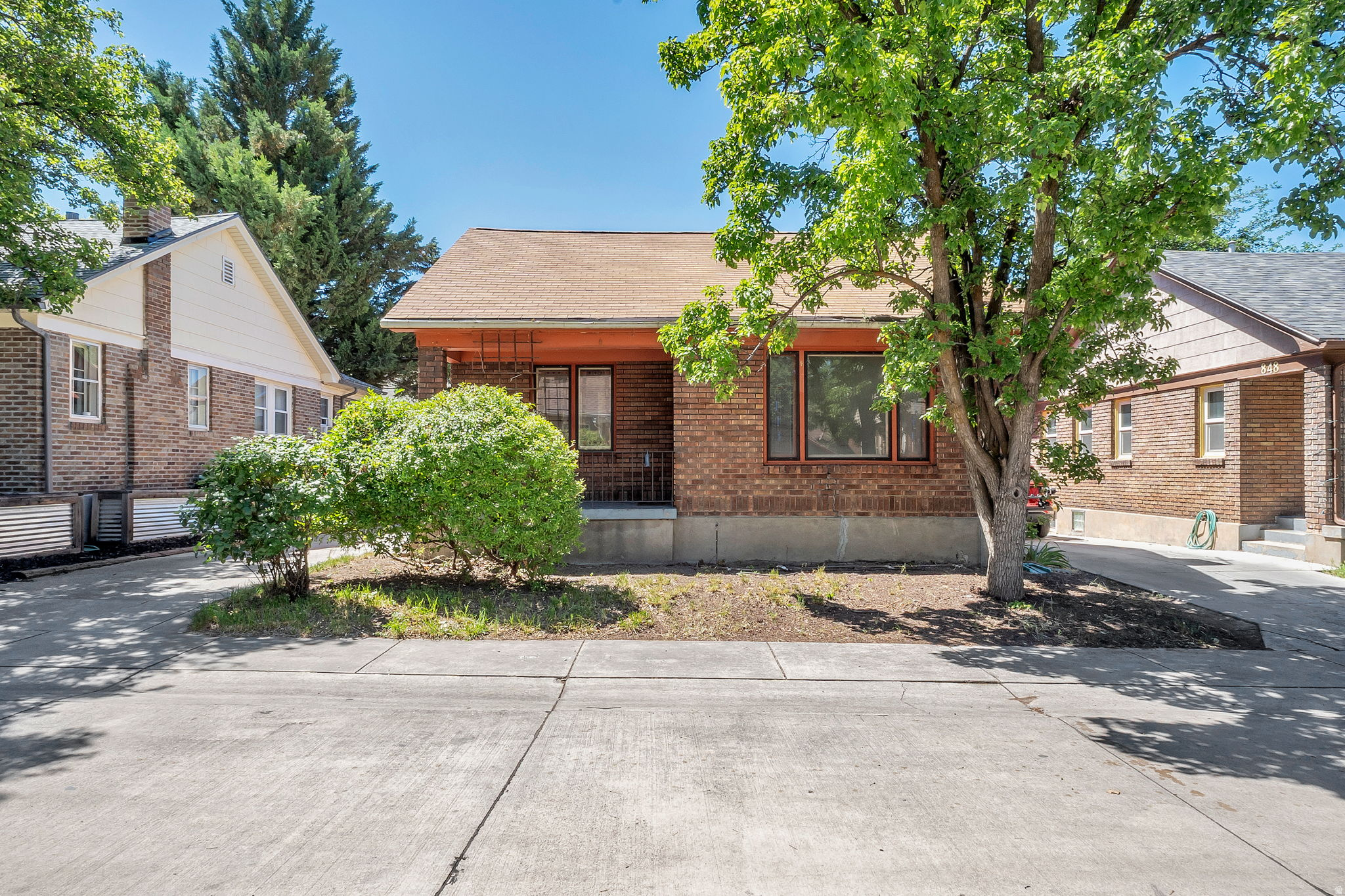 **Showings begin Friday, June 12th at 2 pm** Its the quintessential example of all the things that make people's heart go pitter patter in the 9th and 9th area. A true craftsman bungalow that showcases the historical charms of the era, one of the big draws to homes like these. Original hardwoods, stained glass windows (are you kidding me?), 9 foot ceilings, the cozy porch, and the original moldings, doors and hardware. If a throwback to the early 1900's with todays conveniences of AC and upgraded electrical are what you crave, look no further. Located on a private, dead end with an absolutely perfect patio for morning coffee and off street parking. Google fiber services the home, perfect for the WFH lifestyle.