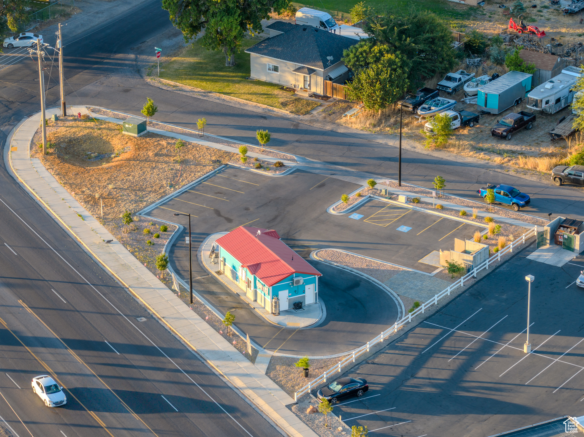 Prime Commercial Drive-Thru Lot in Lehi on State Street. Fully improved 0.43-acre commercial parcel on high-traffic State Street in Lehi. This site includes a 576 square foot stick-built structure, designed for drive-thru beverage or coffee operations, and offers excellent visibility and access potential. Site Improvements: Full curb, gutter, and asphalt.AADT2023 - 16,000 - Check out 3-D tour link.  Owners will lease or sell.
