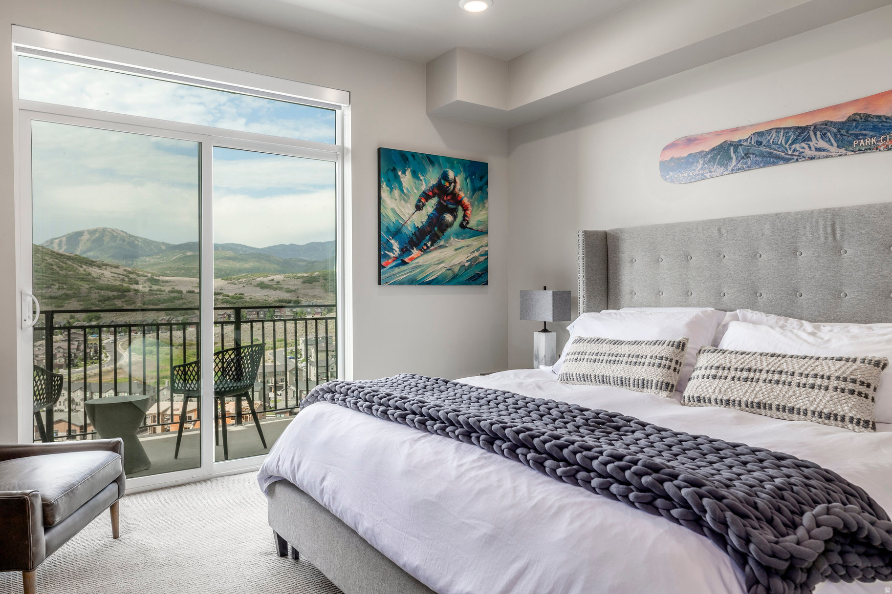 Soak in breathtaking Deer Valley ski run and Jordanelle Reservoir views as you sip coffee by the fireplace or out on your private patio. This light and bright two-bedroom, two-bathroom residence is located on the top floor at Black Rock Mountain Resort features chic mountain-modern upgraded finishes and comes fully furnished. The versatile lock-off floor plan offers flexibility and maximizes rental potential. Enjoy resort-style living with on-site amenities including elegant lounge spaces with fireplaces, a coffee bar and market, restaurant and bar & grill, year-round heated pool and hot tub, steam room, sauna, and a fully equipped fitness center. Perfectly located with easy access to hiking and biking trails, this condo is just 12 minutes to Park City Mountain Resort, 11 minutes to Deer Valley's new East Village, the Jordanelle Reservoir, and 40 minutes to Salt Lake City International Airport.