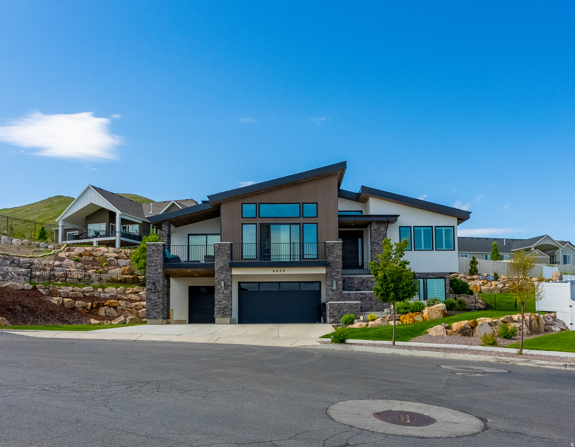 Beautiful modern rambler-style home in the heart of Herriman featuring an open and inviting layout filled with abundant natural light throughout the main level. The spacious kitchen seamlessly connects to the living and dining areas, creating an ideal setting for both everyday living and entertaining. The fully finished basement features an expansive family room with endless possibilities for gatherings, movie nights, game days, or simply relaxing with friends and family. Enjoy generously sized bedrooms, thoughtful finishes, and ample storage throughout, along with stunning valley views perfect for hosting summer evenings and holidays. Conveniently located near trails, schools, and a variety of new restaurants and shops, this home offers the perfect blend of comfort, style, and convenience in one of Herriman's most desirable communities.