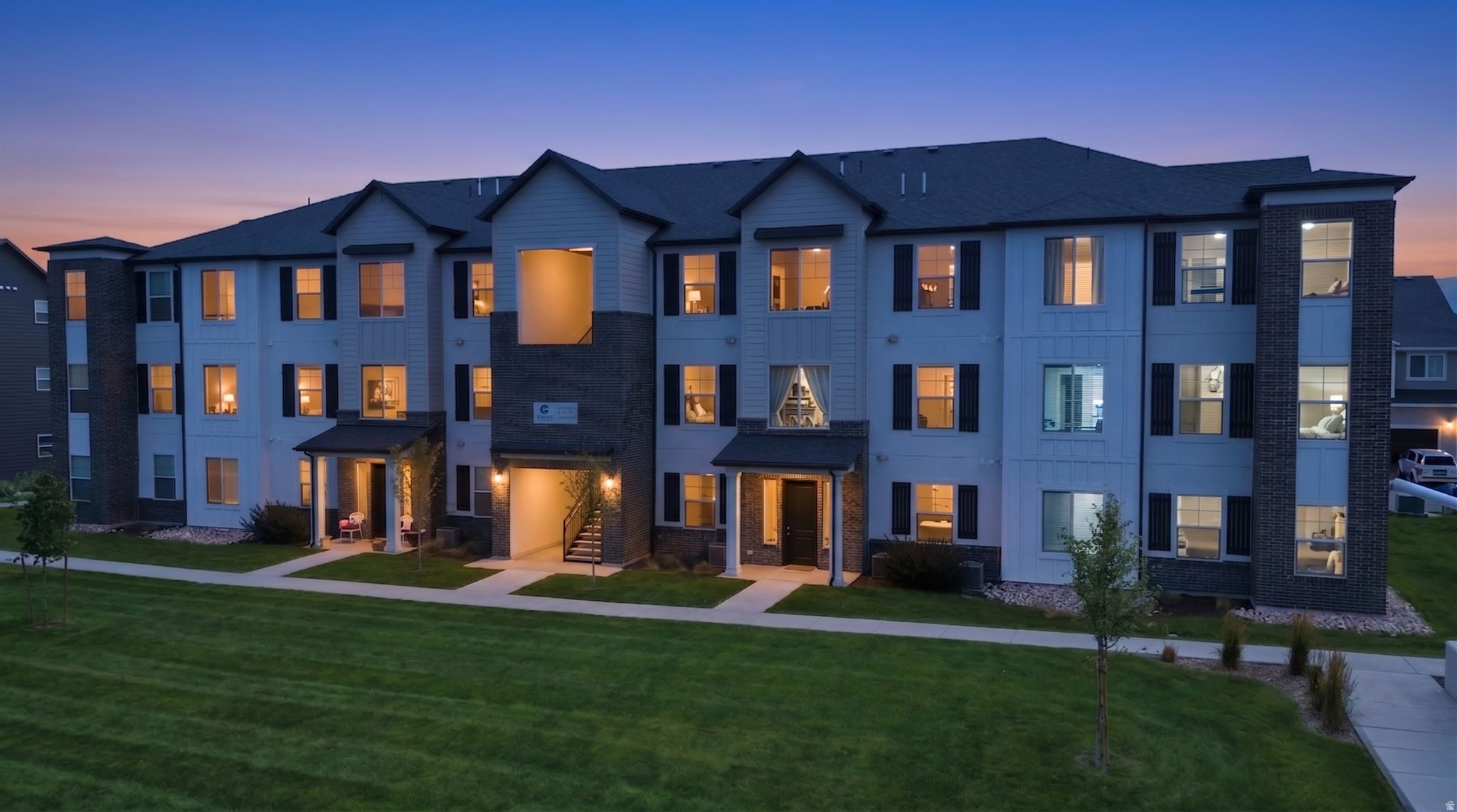 Rare opportunity to own one of the most desirable ground-level units in Gardner Point!  Perfectly situated facing one of the community playgrounds and picnic areas, this thoughtfully designed condo offers a private front porch that is not enclosed within a stairwell, creating a welcoming outdoor space just steps from the mailboxes and community amenities.  Inside, you'll find a spacious open concept layout featuring a large primary suite with a versatile bonus nook-ideal for a home office, nursery, reading area, den or even additional closet space.  Custom closet organizers provide exceptional storage and organization throughout the home.  This unique unit was designed with accessibility in mind and includes step-free living, a roll in shower, grab bars, wheelchair-friendly bathroom features, and an oversized garage with addidtional maneuvering space.  Residents enjoy outstanding commnity amenities including a swimming pool, pickleball courts, playgrounds, picnic areas, and beautifully maintained common spaces.  Conveniently located near shopping, dining, entertainment, schools, and commuter routes, this home combines comfort, convenience, accessibility, and lifestyle in one exceptional package.  Don't miss this rare opportunity to own a highly sought-after accessible unit in one of Lehi's most desirable communities!