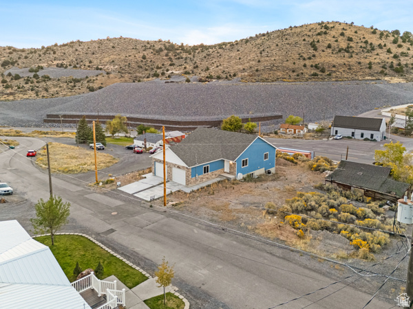 NEW Twin home! Clean and spacious! No HOA. Open floor plan, gorgeous views, central air, water softener included. Fully finished basement with walk out to the back yard. Large lot with enough room for a shop or additional garage. Sweeping views of the mountains and valley. All figures per plans and county records. Buyer to verify.