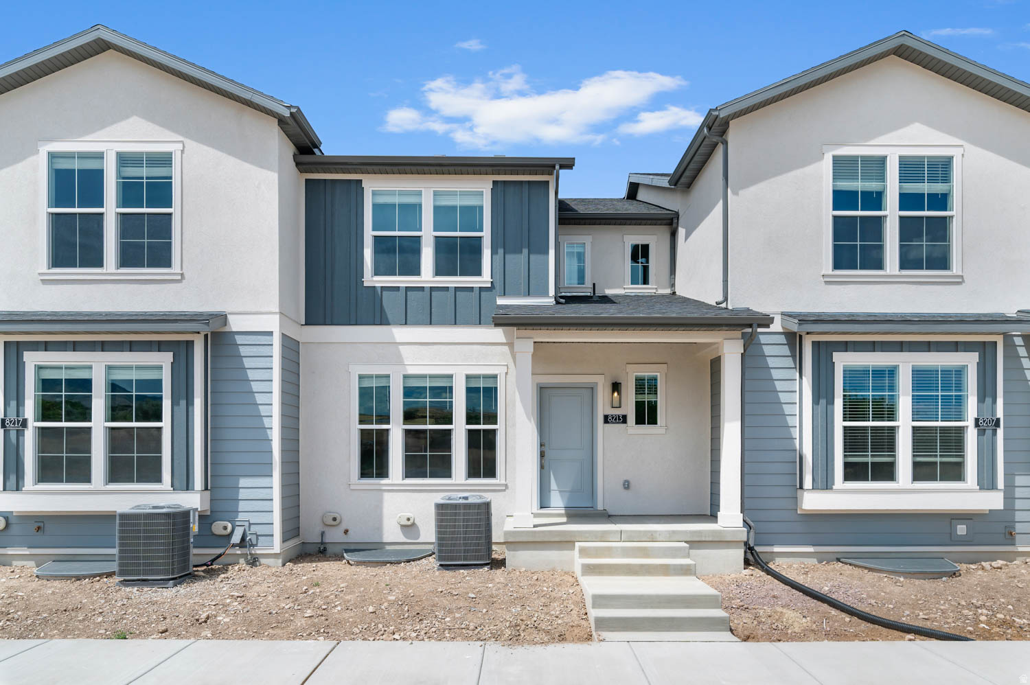 Come see this beautiful brand new Bellevue, a beautifully crafted townhome featuring stylish finishes, functional living spaces, and timeless design. The open-concept kitchen is highlighted by white laminate cabinetry, sleek quartz countertops, and a stainless steel gas appliance package, making it the perfect gathering place for everyday living and entertaining. Enjoy the warmth and durability of laminate hardwood flooring, complemented by luxury vinyl tile in select areas and comfortable carpet in the bedrooms. Elegant Craftsman-style baseboards and casing, satin and brushed nickel hardware, and designer two-tone paint create a refined look throughout the home. The spacious owner's suite offers a relaxing retreat with cultured marble shower surrounds, while the finished basement provides valuable additional living space. A tankless water heater adds modern efficiency and dependable hot water for everyday comfort. Thoughtfully designed with quality finishes and versatile living areas, the Bellevue offers the perfect blend of style, comfort, and functionality!
