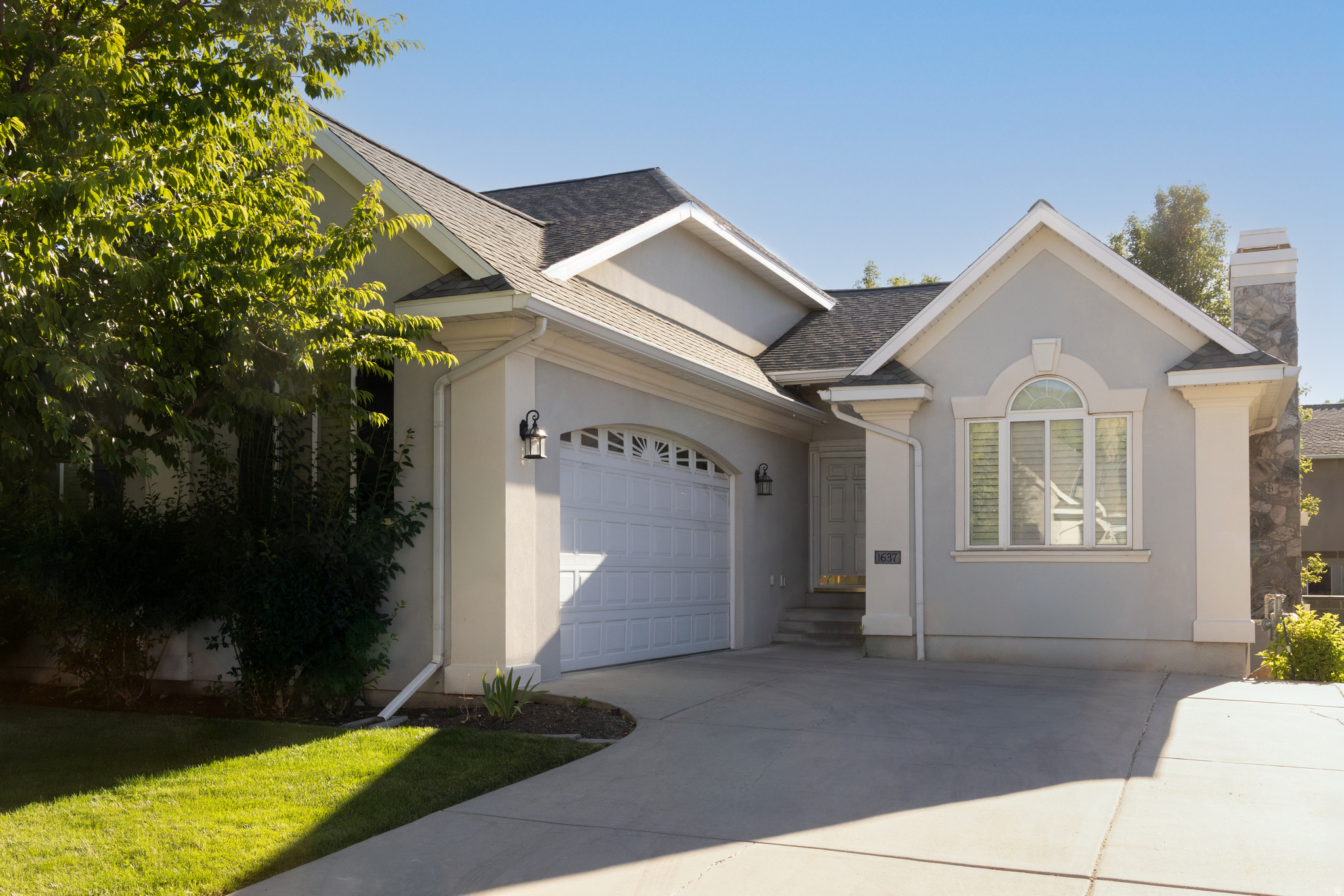Welcome to the desirable Country Springs community in Bountiful! This beautifully designed home features a large, open-concept floor plan with spacious rooms and abundant natural light. The luxurious primary suite is a true retreat, complete with a jetted tub, generous walk-in closet, and skylight. Enjoy effortless single-level living while entertaining family and friends both upstairs and downstairs. The lower level includes a second plumbed kitchenette, a dedicated theater room perfect for movie nights, and plenty of flexible space. Outside, relax on the patio and enjoy mountain views, convenient gas grill hookup. Located in a quiet, highly sought-after neighborhood, this home offers the ideal blend of comfort, functionality, and community.