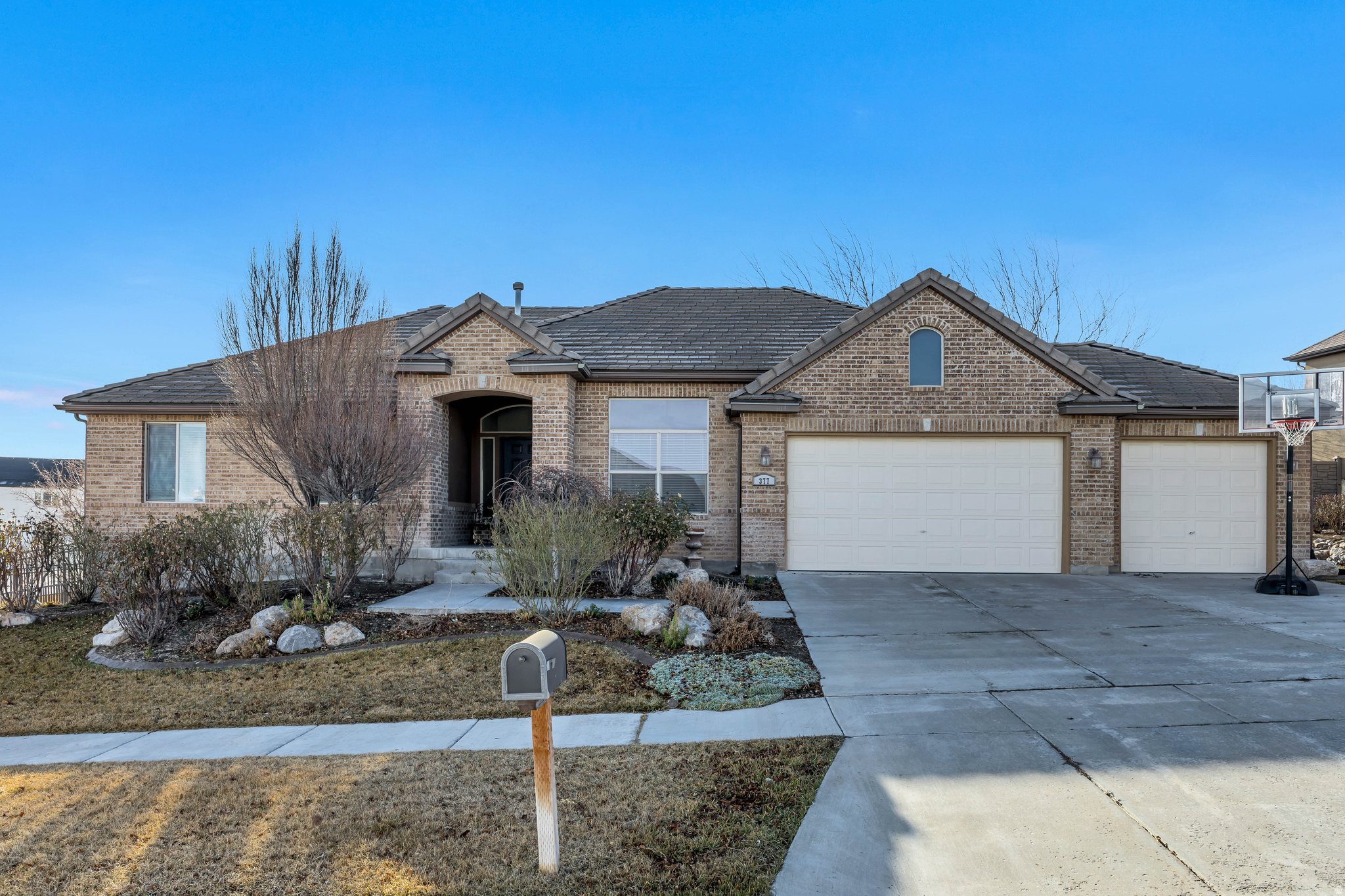 Come see this BEAUTIFUL 5 bedroom 3 bath rambler located in a quiet neighborhood in Saratoga Springs! Pictures don't do this home justice, VERY SPACIOUS. Enjoy stunning views of Utah Lake from the back deck. The kitchen is perfect for entertaining, featuring a double oven and extra long quartz island. The basement offers 9 foot ceilings, a spacious great room with an impressive theatre room and a wet bar. Walking distance to elementary school and parks. Enjoy the parks and many amenities of the neighborhood without an HOA.