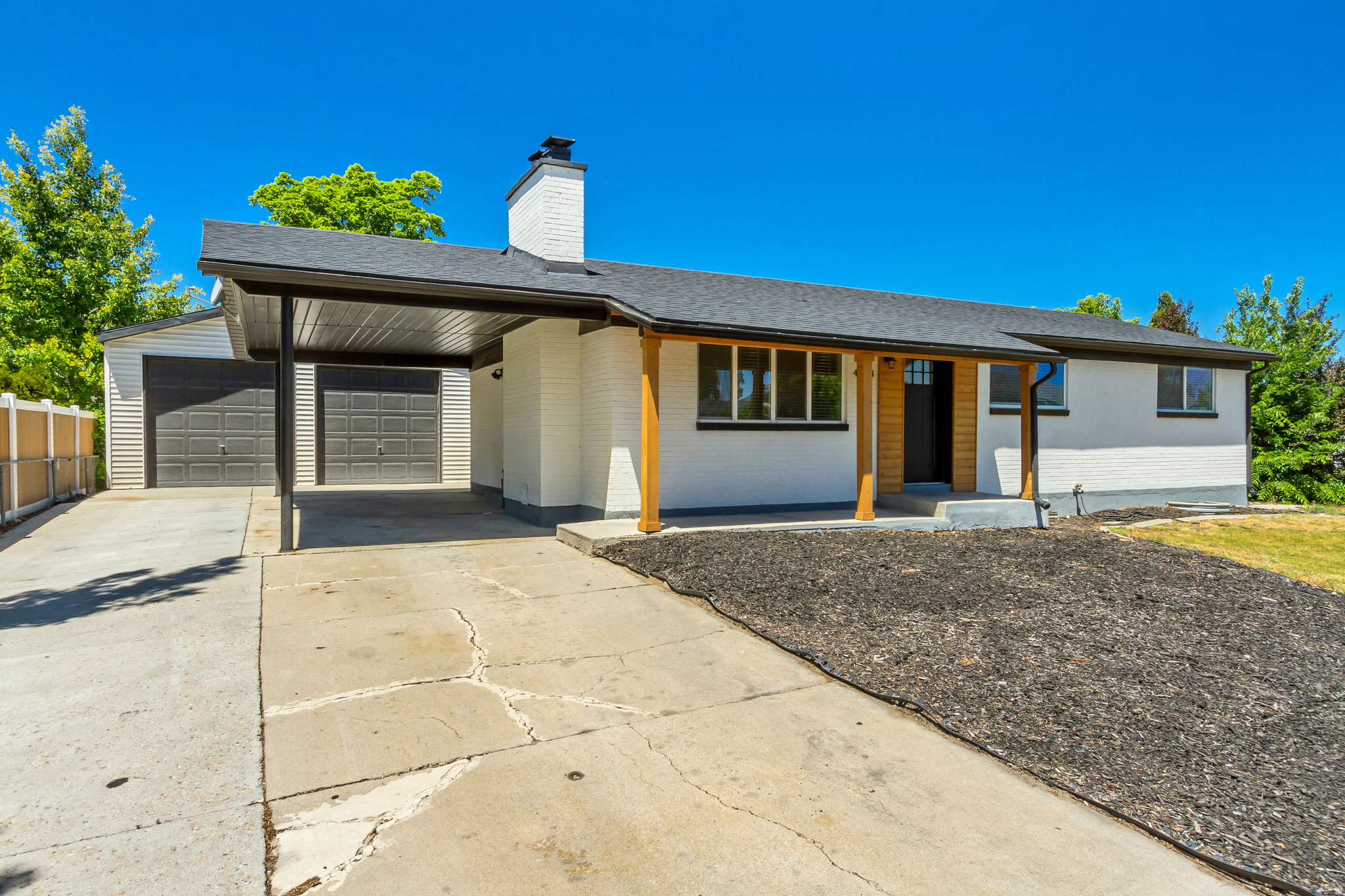 Spacious and versatile, this beautiful home offers the perfect blend of comfort, functionality, and income potential. Fully remodeled just two years ago, the home features updated finishes and modern touches throughout, giving you the feel of a newer home without the wait. The property includes a fully equipped mother-in-law apartment with its own private entrance-ideal for multi-generational living or rental income. The apartment offers a full kitchen with dishwasher, in-unit laundry, and a layout designed for privacy and convenience. The half bath on the main level is off the master bedroom. What truly sets this property apart is the impressive 900 sq ft detached garage/shop-a dream setup for hobbyists, contractors, or anyone needing serious workspace. Outfitted with a heater for year-round use, built-in workbench, oversized doors for larger vehicles or equipment, and both 120V and 240V power with a separate panel, this shop is ready for just about anything. Whether you're looking for flexible living options, additional income, or the ultimate workspace, this property delivers on all fronts.   Square footage figures are provided as a courtesy estimate only and were obtained from county records .  Buyer is advised to obtain an independent measurement.