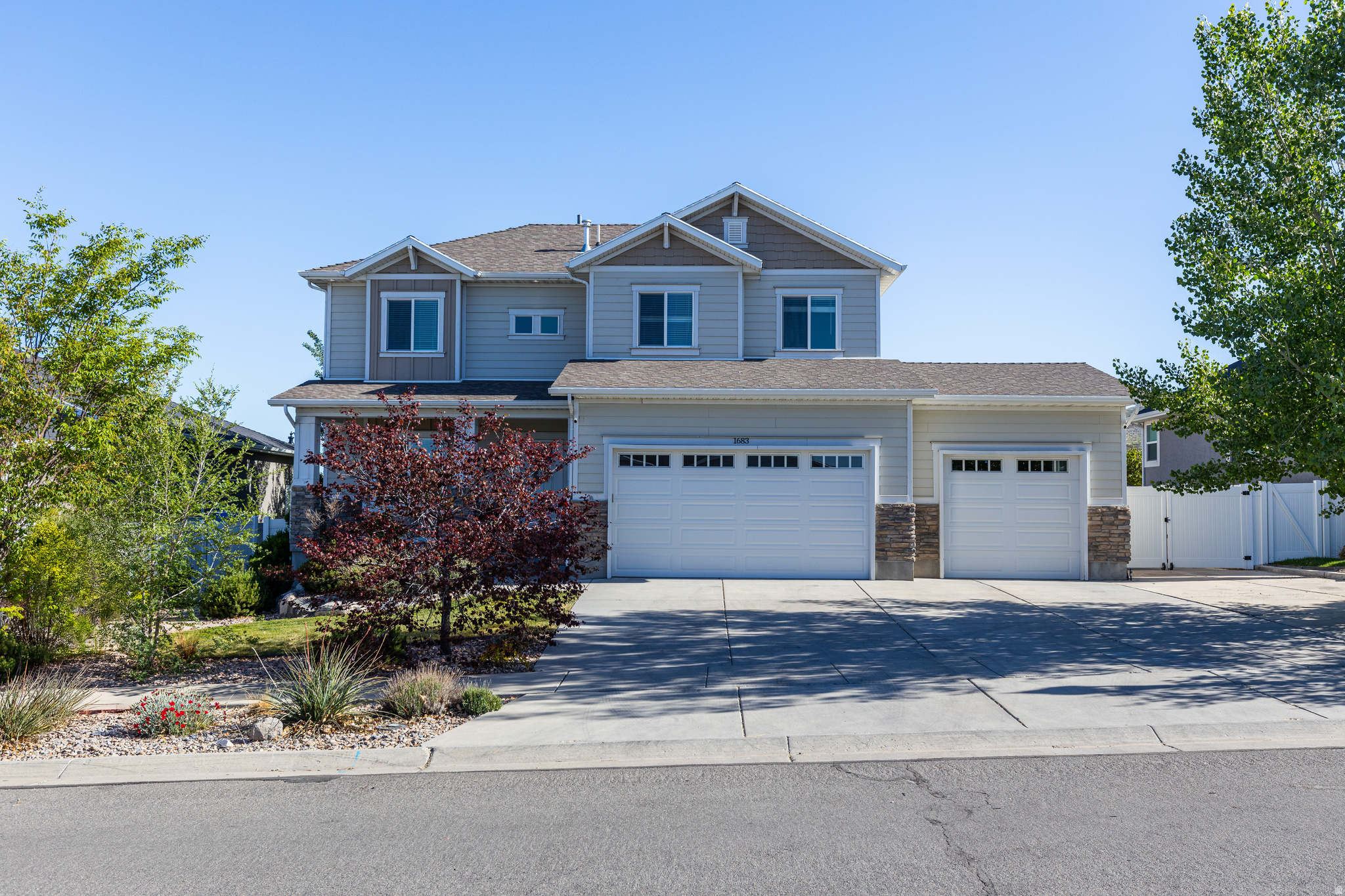 Welcome to this beautiful two-story home located in the highly desirable Parry Farms neighborhood in Bluffdale! Designed with family living and entertaining in mind, this home has it all. Enjoy a spacious three-car garage and an incredible backyard oasis featuring a Trex deck built around a brand-new hot tub, gorgeous landscaping, garden boxes, grapevines, a storage shed, and a bicycle path. Inside, the fully finished basement includes a dance studio, or gym space, cozy family area, bedroom, study space, and craft area - perfect for hobbies, guests, or working from home. The main floor offers an open-concept layout with a welcoming family room and kitchen ideal for gathering and entertaining. Upstairs, you'll find a large master suite, 3 guest bedrooms, and a convenient upstairs laundry room. Additional highlights include: Covered front porch Quiet cul-de-sac location Family-friendly layout Beautiful indoor and outdoor living spaces Solar panels, Soft water. and outdoor lighting.