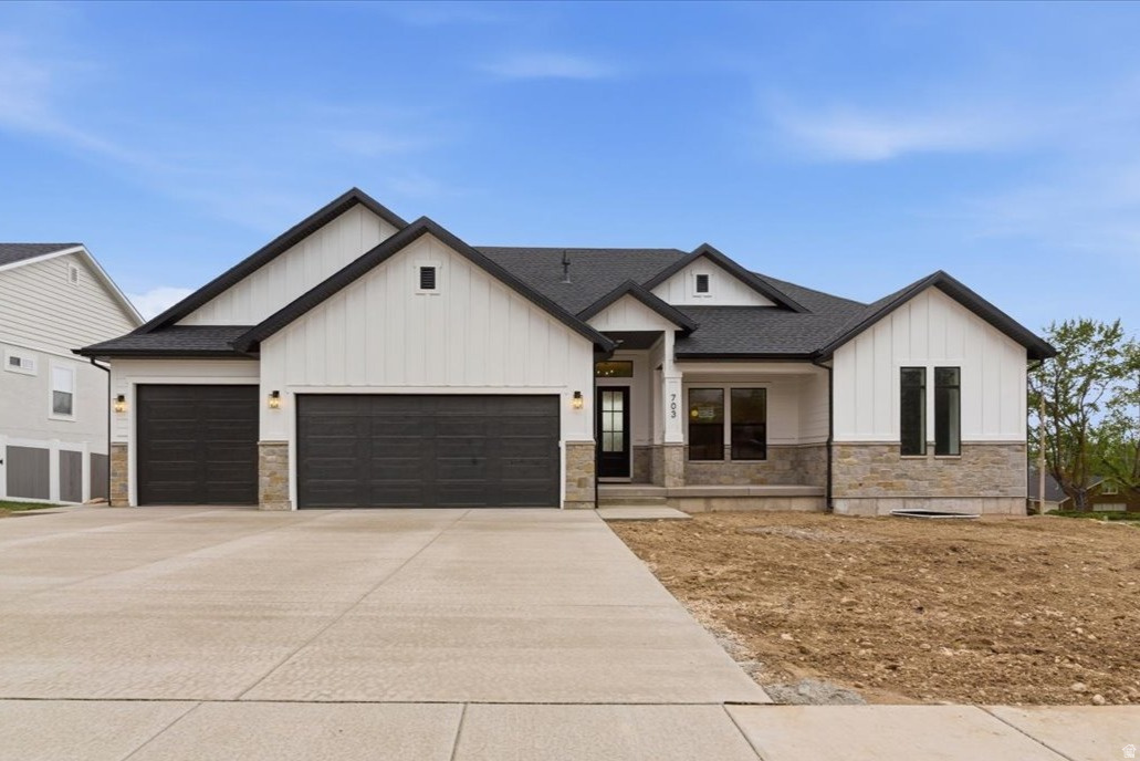 Amazing custom NEW CONSTRUCTION in North Ogden. This home features a very functional rambler floor plan with SINGLE LEVEL LIVING along with a large finished basement . This home is located close to various outdoor trails and parks (Barker Park (amphitheater), Wadman Park, 2750 N Trailhead, Half Moon Rock) along with local shopping along 2700 North.  Home features a large owners bedroom / bathroom suite with separate tub / shower and large walk-in closet. Entrance features a den / office with attached bathroom. Large finished basement with great room, kitchenette, 2 bedrooms w/ walk-in closets and a bathroom.  Home has a large attached garage with 3rd car garage being double deep.  This home has custom touches throughout from the custom cabinets, quartz countertops, gas fireplace, walk-in pantry, 3-tone paint, custom lighting, custom finish work, large covered deck / patio and so much more!