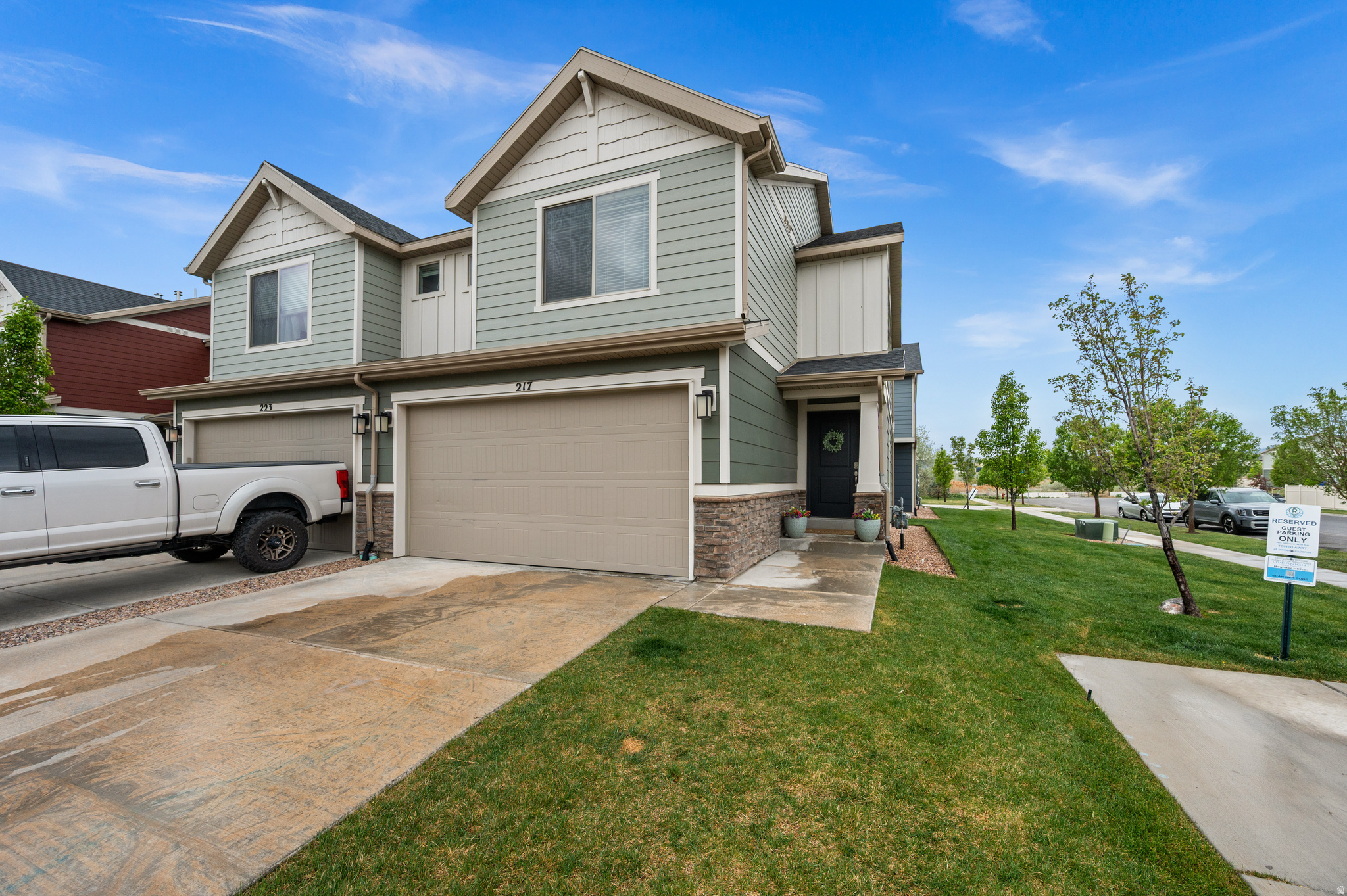 Price Improvement! Welcome to your new home, this large end-unit townhome is nestled in a quiet neighborhood right on the Jordan River. Conveniently located with access to trails, dining, & all your shopping needs. This three-bedroom, two-bathroom home has been meticulously taken care of. The kitchen offers a large quartz island and plenty of storage. The 2-car garage and large 6-foot deep crawl space give this home more storage than expected. Don't miss out on your chance to walk through this home and make it yours.