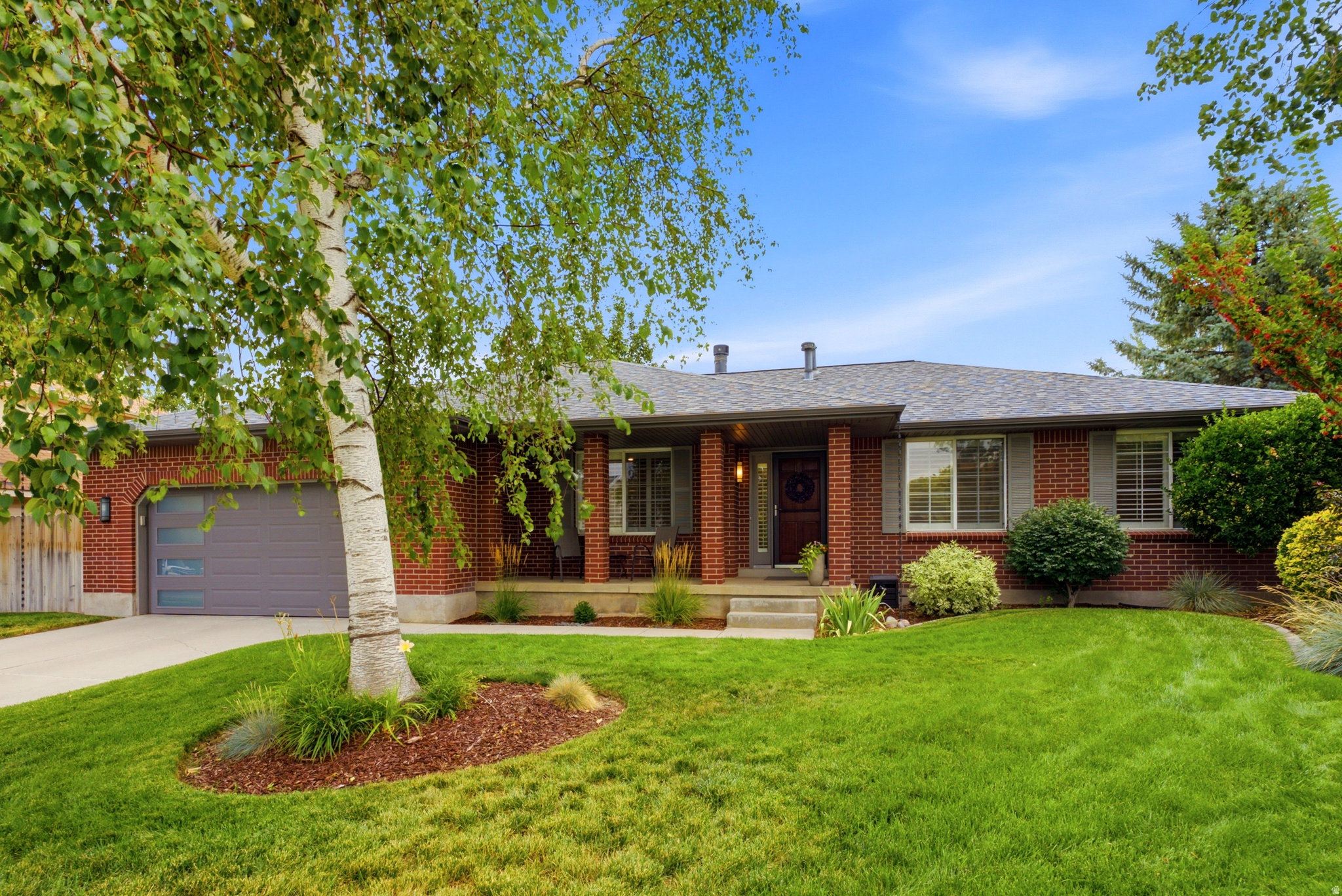 Welcome home to this meticulously maintained rambler with a finished basement, offering comfortable main-level living and exceptional pride of ownership throughout. This home is located in desirable East Sandy with 5 bedrooms and 3.5 bathrooms. The spacious primary suite is conveniently located on the main level with oversized master bathroom featuring zero stair glass shower. Ideal layout for main level living.  The updated kitchen features granite countertops, high-end Jenn-Air stainless steel appliances, and abundant workspace. All bathrooms have been beautifully remodeled and updated.  Designed with entertaining in mind, the finished lower level provides an incredible gathering space, while the cozy fireplace on the main level adds warmth and charm. Additional updates include a newer roof, furnace and A/C.  Step outside to your own private retreat with a beautifully landscaped backyard, perfect for relaxing or hosting family and friends. The garage offers tons of storage for added convenience.  Ideally located close to shopping, dining, and everyday amenities. So close to the mountains, you can be to the mouth of Little Cottonwood Canyon in 5 minutes, providing quick access to world-class skiing, hiking, and year-round outdoor recreation.  This home is packed with quality features and is truly move-in ready!  Square footage figures are provided as a courtesy estimate only and were obtained from county assessor .  Buyer is advised to obtain an independent measurement.