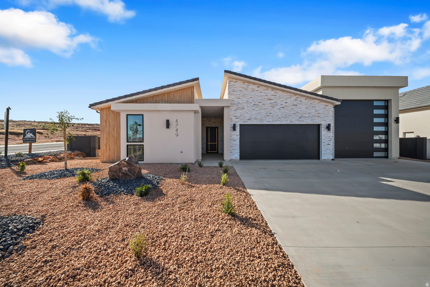 ~58' RV GARAGE SAND HOLLOW~ 360 Degree Landscaping Included! This single level Big Rock Homes home is in the sought-after Sand Hollow Village. One of the home's standout features is the massive 58-FOOT DEEP RV GARAGE. Inside, you'll find an open-concept layout with LUXURY FINISHES. REAR LANDSCAPING INCLUDING! 4 security cameras are wired through out the exterior of the home. - Ask about lender incentives! Just minutes from Sand Hollow Reservoir, Sand Hollow Golf Course, the sand dunes, and Zion National Park, you're surrounded by year-round adventure. Additional rear landscaping packages available. Contact listing agent for showings & Incentives!