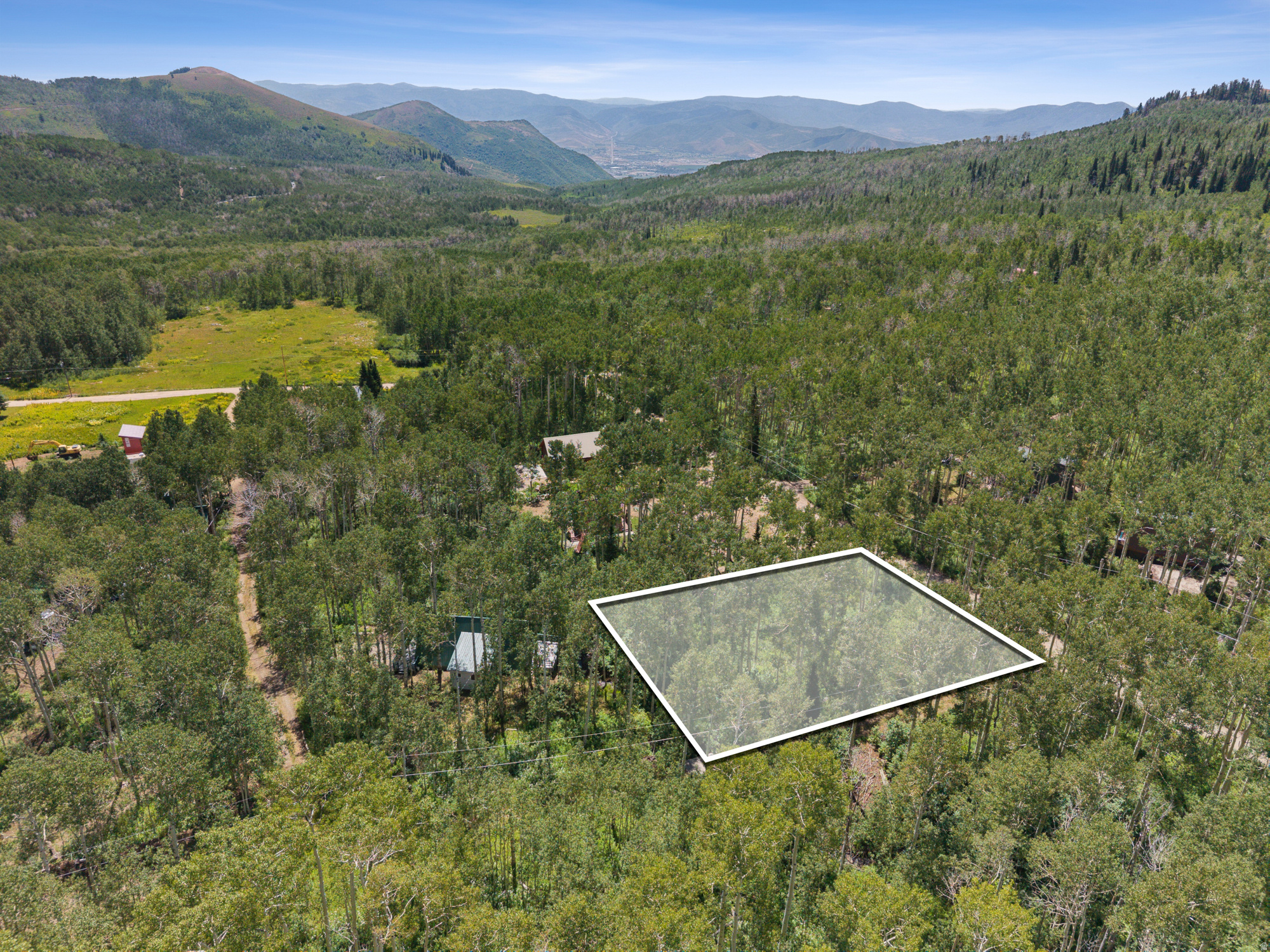 Public Remarks: Discover a rare opportunity at 2244 Boulder Drive, where nature, recreation, and convenience come together. This exceptional lot features a flat, usable building site, a true rarity in the mountains, complete with valuable water rights and a seasonal stream that borders the property for added serenity. Nestled in a mature aspen grove known for its vibrant fall colors, the setting offers a picture-perfect backdrop for your future mountain retreat. Enjoy unparalleled recreational access throughout the year. In the summer months, explore world-class hiking and biking trails, take your side-by-side or ATV through scenic terrain, or enjoy nearby golfing along with the shops and restaurants of Midway and Park City just minutes away. The property is perfectly positioned for incredible sunrises and sunsets, surrounded by the quiet rustle of aspens and the peaceful sound of running water. In winter, the lot becomes your personal backcountry basecamp with snowmobile access to multiple peaks and a gateway to unforgettable powder days. Whether you're building a weekend getaway or your long-term mountain escape, you'll be close to Deer Valley, Park City Mountain, Brighton, Solitude, Midway, and the Salt Lake Valley. 2244 Boulder Drive offers a rare blend of privacy, scenery, and access to everything that makes mountain living extraordinary.