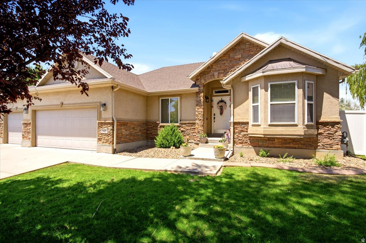 Beautiful, move-in ready, and meticulously maintained, this exceptional home sits on a spacious 0.20-acre lot, tucked away in a quiet, welcoming neighborhood. From the attractive landscaping and gorgeous curb appeal to the oversized 3-car garage, this property makes a lasting first impression.  Inside, you'll find 5 generously sized bedrooms, 3 full bathrooms, flex room, vaulted ceilings, and bright, inviting living spaces designed fo everyday living, home office and entertaining.  Step outside to your fully fenced, private backyard featuring mountain views, a spacious patio area, and a cozy fire pit-perfect for relaxing evenings, family gatherings, or entertaining guests.  Conveniently located with quick freeway access, this home is just minutes from shopping, restaurants, parks, walking trails, Front Runner, and Hill Air Force Base, making commuting and everyday errands a breeze.  This is a rare opportunity to own a beautifully cared-for home in an outstanding location that truly has it all!