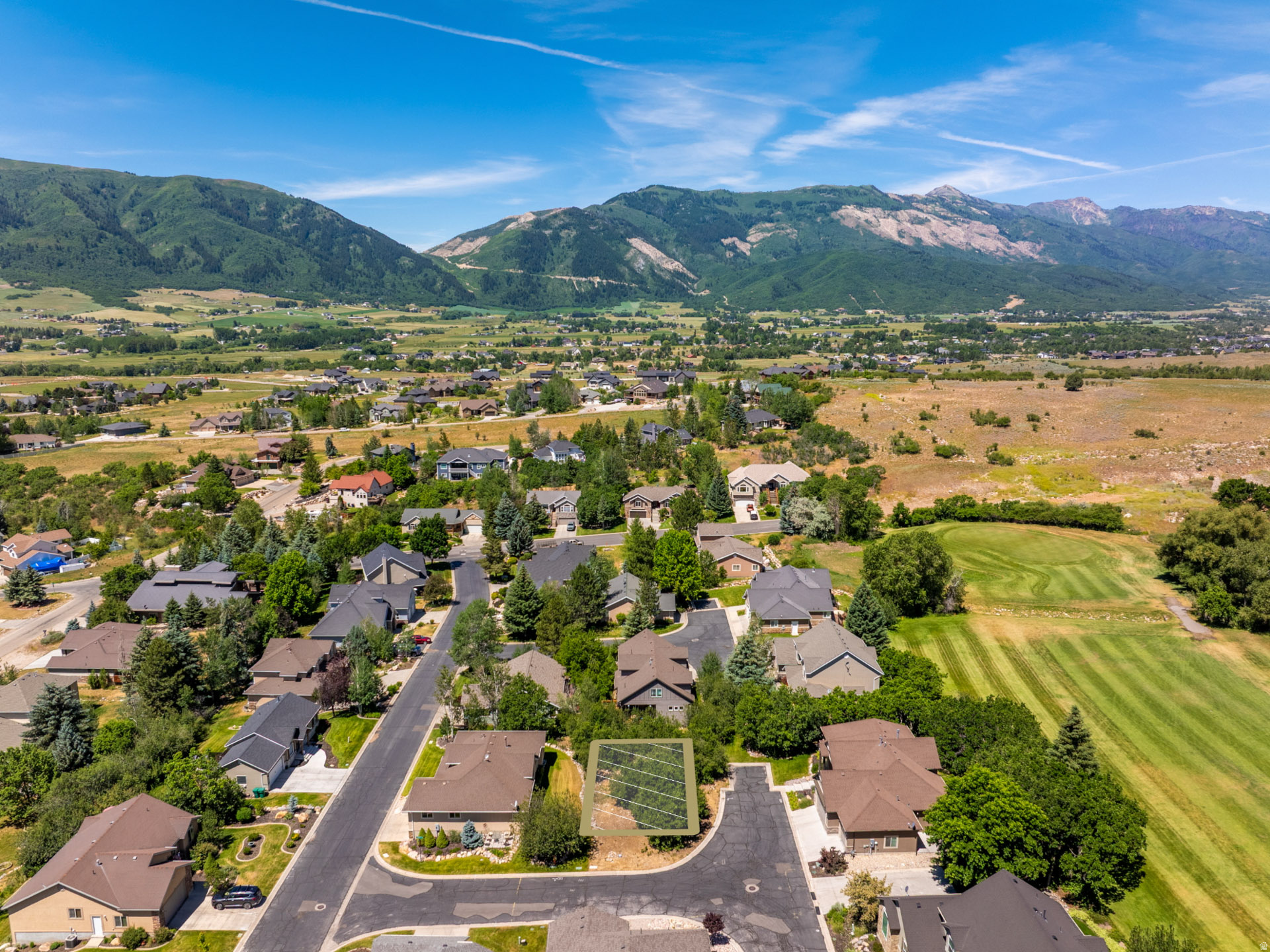 Opportunities to establish yourself in Ogden Valley at this price point are becoming increasingly rare. Located in a quiet neighborhood with convenient access to year round recreation, this property offers an ideal blend of privacy, accessibility, and mountain living. The setting provides a surprising sense of separation and tranquility, creating the perfect backdrop for a future mountain retreat. Imagine designing your dream home where mornings begin with fresh mountain air and evenings are spent enjoying the peaceful surroundings after a day of adventure. Location is one of the property's greatest strengths. Wolf Creek Golf Course is just minutes away, while Powder Mountain is approximately eight minutes from your doorstep. Snowbasin Resort, Pineview Reservoir, miles of hiking and biking trails, and endless outdoor recreation are all within easy reach. Whether you're envisioning a full time residence, a weekend escape, or a long term investment in one of Northern Utah's most sought after mountain communities, this lot offers an exceptional opportunity. With limited inventory and growing demand throughout Ogden Valley, finding a homesite that combines a quiet setting with such convenient access to recreation is becoming increasingly uncommon.