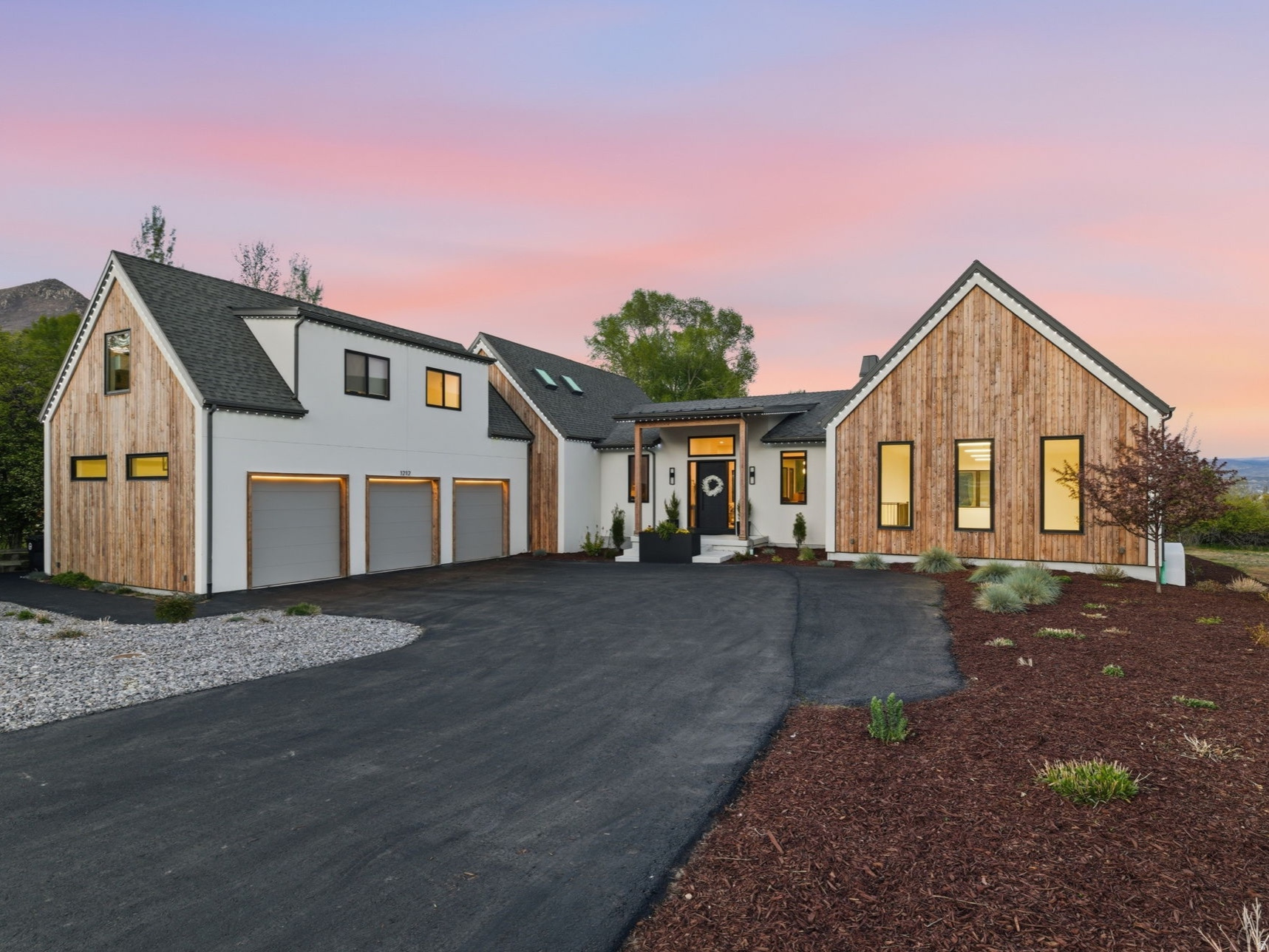 Exceptional Midway property tucked away on a short private lane offering rare privacy and protection from local traffic. Ideally located just a one-minute walk to Wasatch Mountain State Park, with quick access to Wasatch Mountain Golf Course, the WOW Trail, mountain biking pump track, and the Midway walking trail right outside your door-complete with the peaceful sound of a nearby stream. A thoughtfully designed layout captures stunning views of the wetlands, offering daily wildlife sightings and seasonal beauty. The home is built for both comfort and efficiency, featuring laundry on every level, radiant heat on the main and basement levels, and forced air systems throughout. The kitchen is designed for cooking and entertaining, with an induction cooktop, reverse osmosis water system, ice maker, double dishwashers, Bosch oven and speed oven, and generous space for hosting. Multiple fireplaces enhance the living room, primary suite, and basement. The lower level also includes a theater room, gym, kitchenette, and a dedicated sport court with premium Gerflor Taraflex flooring designed for high performance, safety, and durability. Exterior features showcase locally crafted Shou Sugi Ban wood, a heat-treated and hand-finished material known for its durability, fire and insect resistance, and timeless appearance. The private backyard is designed for year-round enjoyment with a low-maintenance saltwater pool and integrated hot tub. A beautifully landscaped separate entrance for the basement apartment provides added privacy for both homeowners and guests. Exterior LED trim lighting offers customizable color, pattern, and timing for holidays or everyday ambiance. Square footage figures are provided as a courtesy estimate only and were obtained from floor plans.  Buyer is advised to obtain an independent measurement.