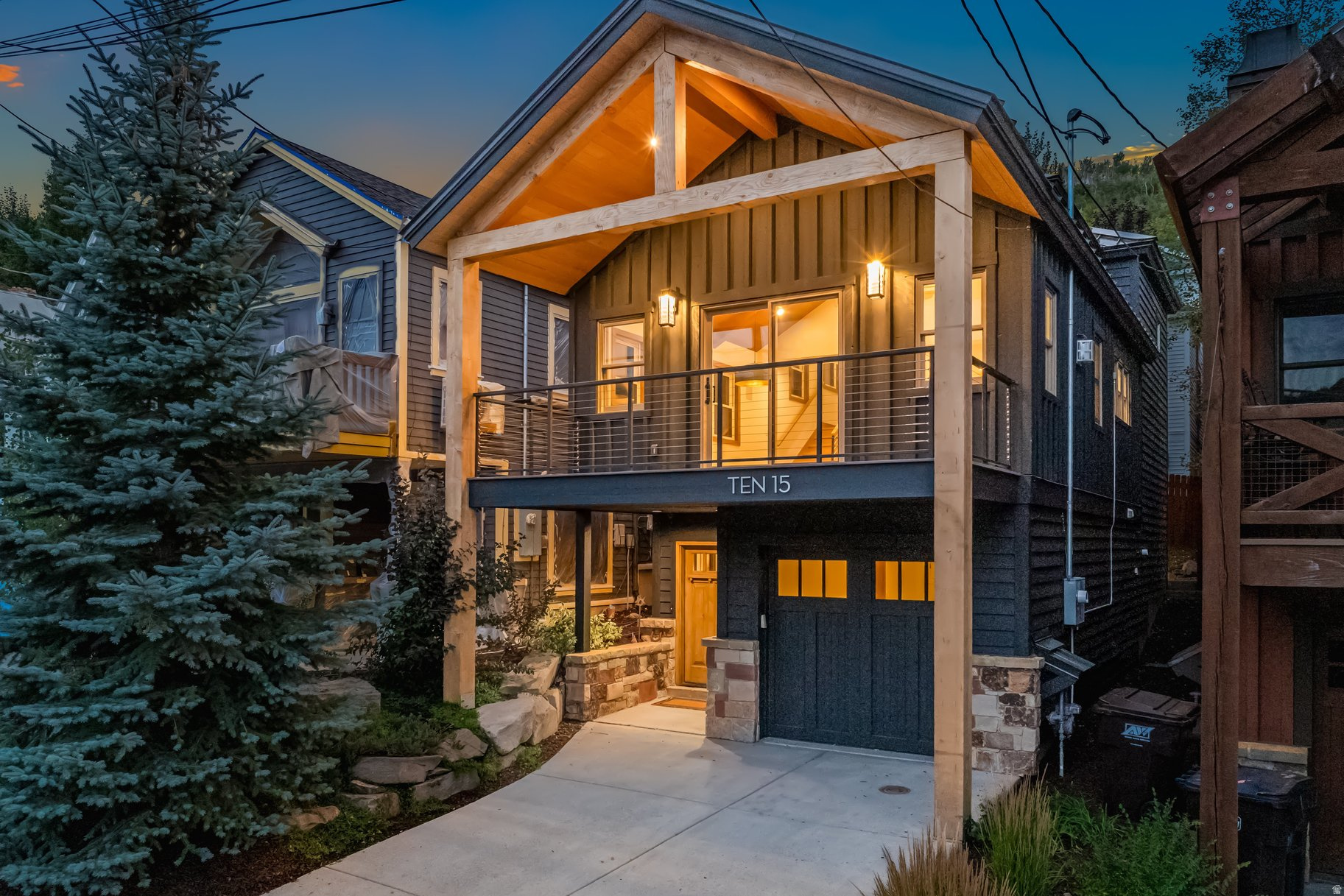 Thoughtful design comes together in this beautifully remodeled Old Town home. Blending mountain charm with modern updates, this inviting residence offers an exceptional location just steps from Park City's renowned Old Town lift, and main street area with dining, shopping, and entertainment.  Inside, white oak flooring, custom finishes, and abundant natural light create warm, comfortable spaces. The great room serves as the heart of the home, featuring a statement fireplace and large windows, and sliding doors that open to a terrific balcony, constantly bringing the outdoors in. The kitchen is equally impressive, equipped with Caf by GE appliances, quartzite countertops, a farmhouse sink, reverse osmosis water system, and plenty of workspace for cooking and gathering with family and friends. The entire upper level is dedicated to the primary suite, offering a private retreat with vaulted ceilings, generous windows, a custom walk-in closet, and its own laundry area. Guest bedrooms each feature en-suite bathrooms with beautiful tile work and designer finishes. Additional features include an expanded covered deck, radiant in-floor heating, a whole-house humidifier, a durable 40-year metal roof, a separate lower-level laundry room, and ample storage for skis, bikes, and gear. With fewer stairs than many Old Town homes, the layout is both practical and welcoming. Whether you're looking for a full-time residence, mountain getaway, or nightly rental/investment property, this is a rare opportunity to own a move-in-ready home in one of Park City's most desirable areas of Old Town.