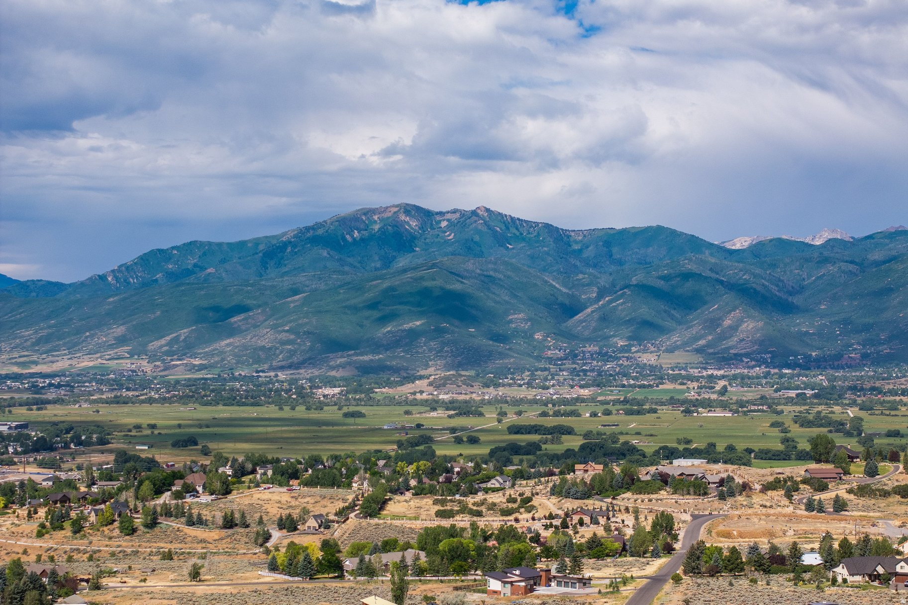 Elevated above the Heber Valley on one of Red Ledges' most scenic ridgelines, this luxury custom homesite offers commanding views, exceptional privacy, and a premier setting for a legacy mountain residence. Positioned on a quiet culdesac this lot captures sweeping panoramas of Mt. Timpanogos, the Wasatch Range, and the meticulously designed Jack Nicklaus Signature Golf Course. This 5.84-acre homesite has a generous building envelope and extended driveway.  ARC approved plans available and a Full Golf Membership is available with deposit (not included in purchase).  This is a rare opportunity to secure a view lot in one of Utah's most soughtafter neighborhoods.