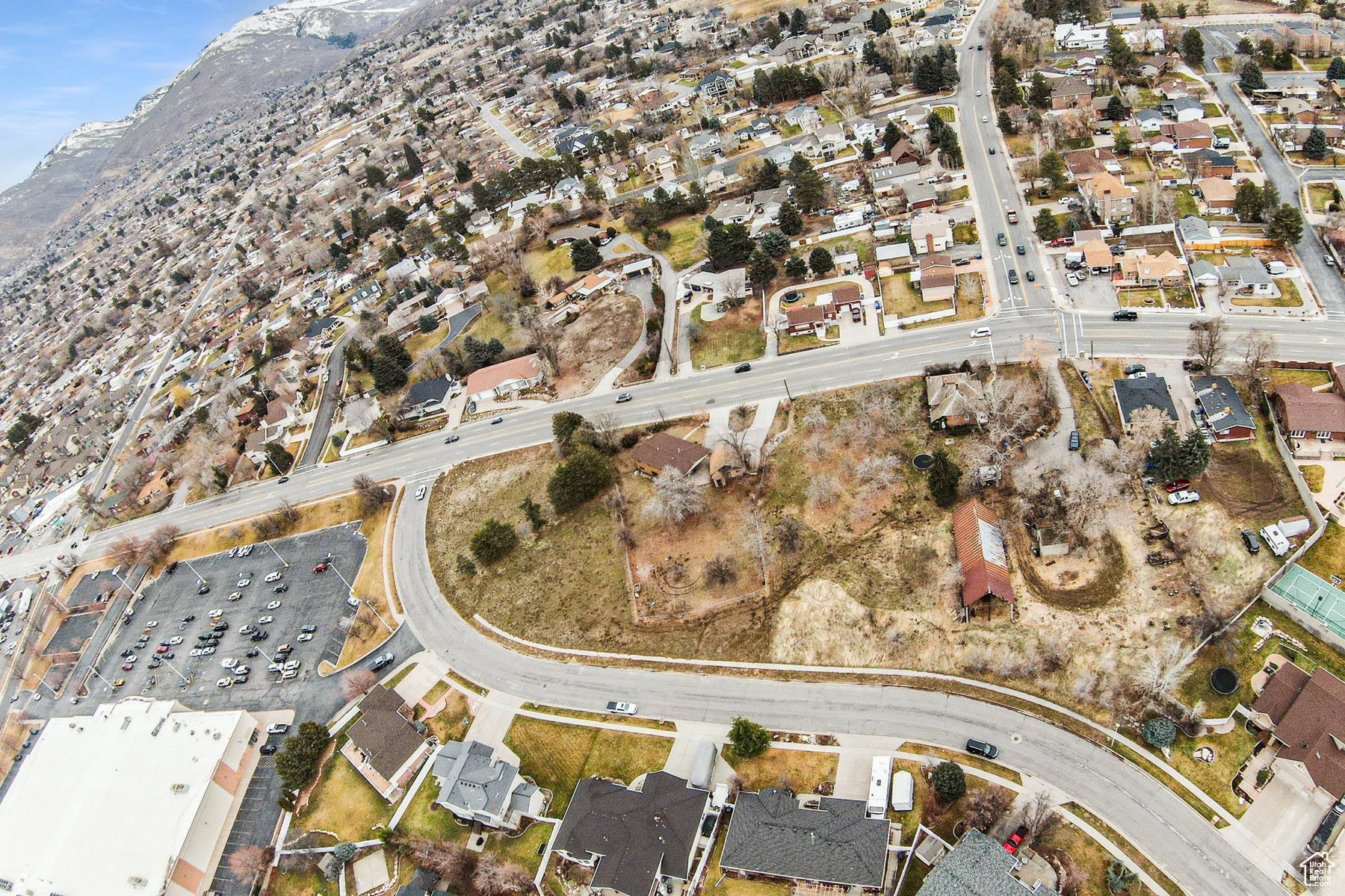 The property includes the following parcels, 05-005-0090, 05-002-0123, 05-002-0124. Great development property.  Thru discussions with Bountiful the property is currently zoned for mixed use and or commercial.    There are 2 existing homes on the property and an old Barn.  The property has been surveyed and ready for development.