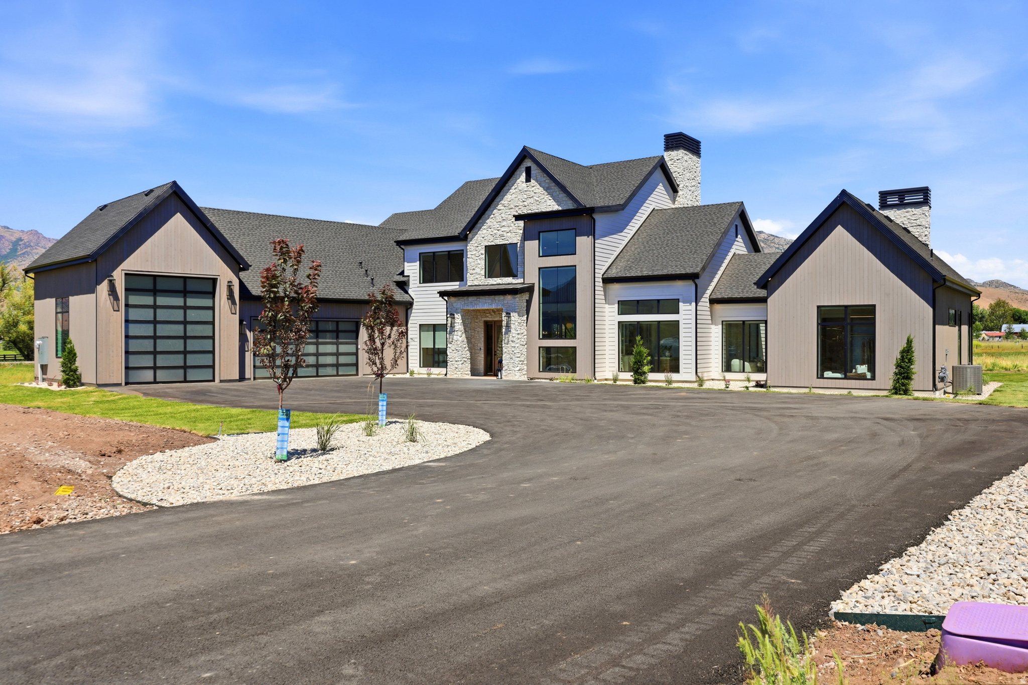 This show-stopping home is the creative genius of award winning REV Builders.  No detail has been overlooked when it comes to workmanship and extraordinary design.  REV Builders won the prestigious "People's Choice" award in the 2025 Parade of Homes and this year no one would be surprised if they won it again!  From the well thought out flow and functionality to the custom builtins and extra large windows that showcase the 360 degree mountain views the only question you will be asking is when can we move in!  Minutes away from Pineview Reservoir and several world class skiing resorts come find out why Utah is the new best place to live!